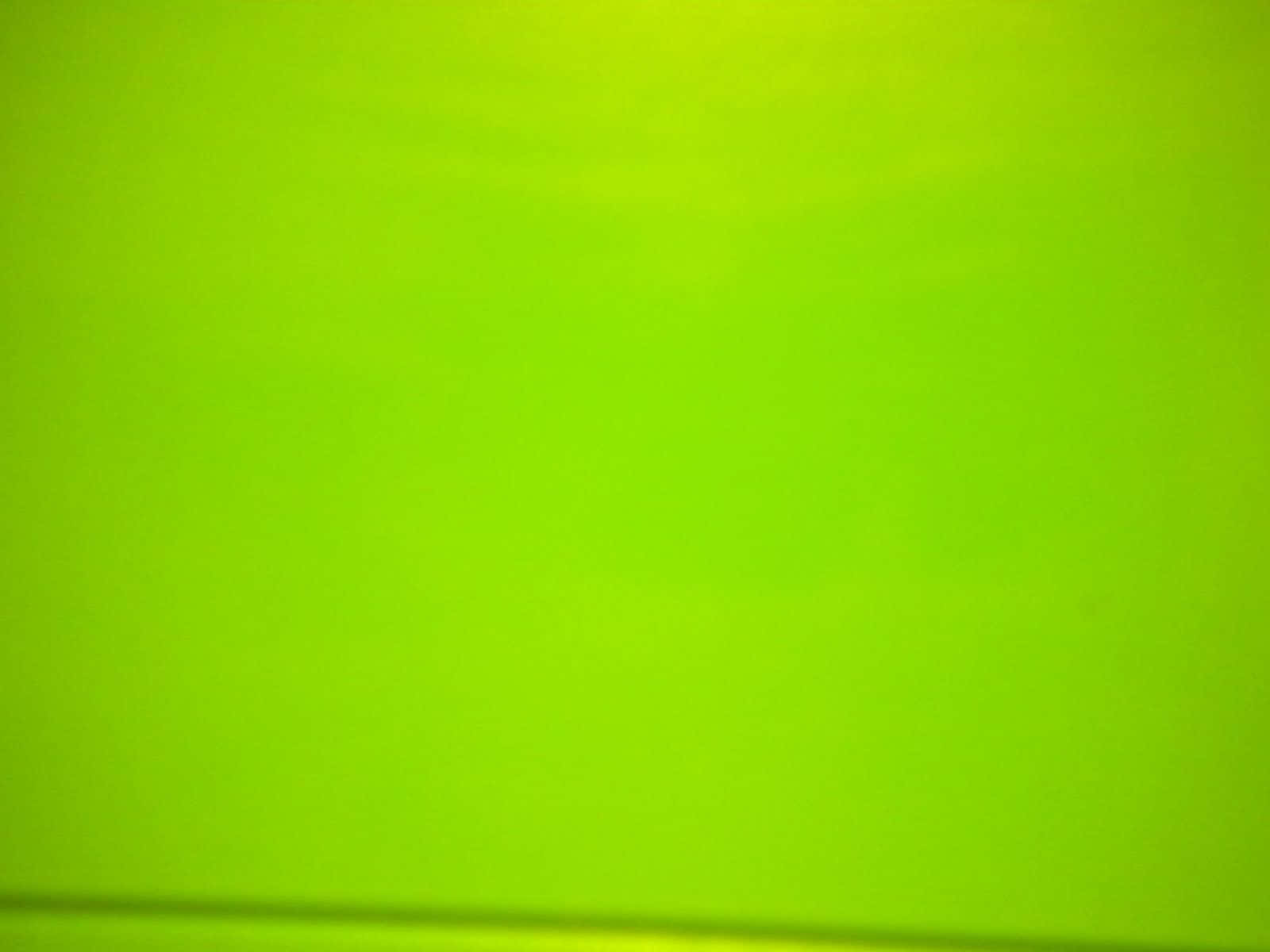 Lime Green 桌布 壁紙 — 平滑的鮮豔萊姆綠色漸變，底部附近有微妙的水平陰影。
