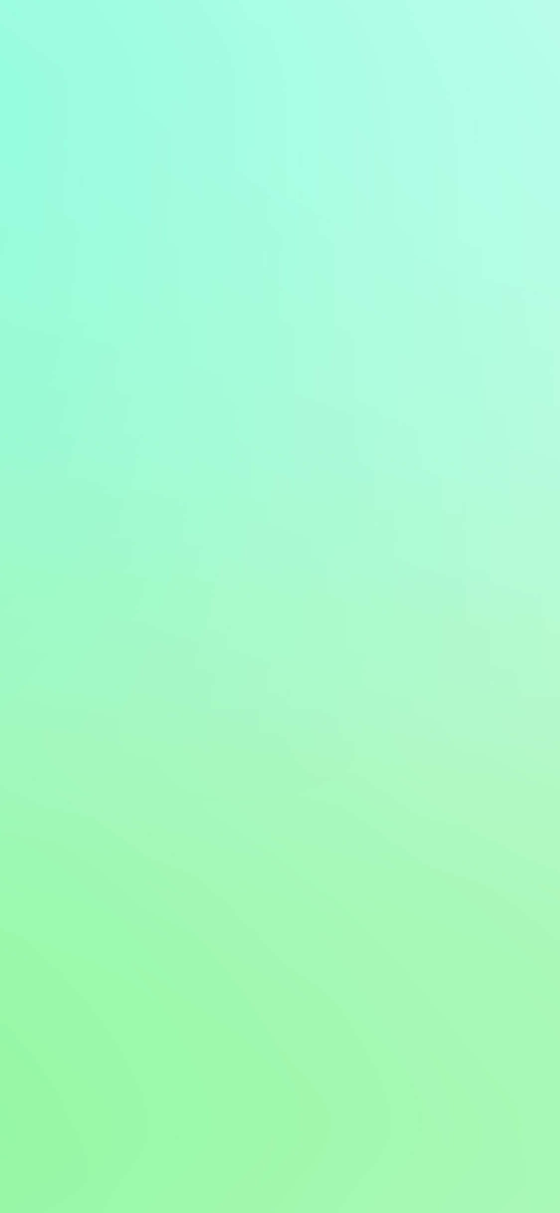 iPhone 11 Green 桌布 壁紙 — 平靜的漸層桌布，從薄荷綠過渡到柔和萊姆色，帶有微妙的雲狀紋理。