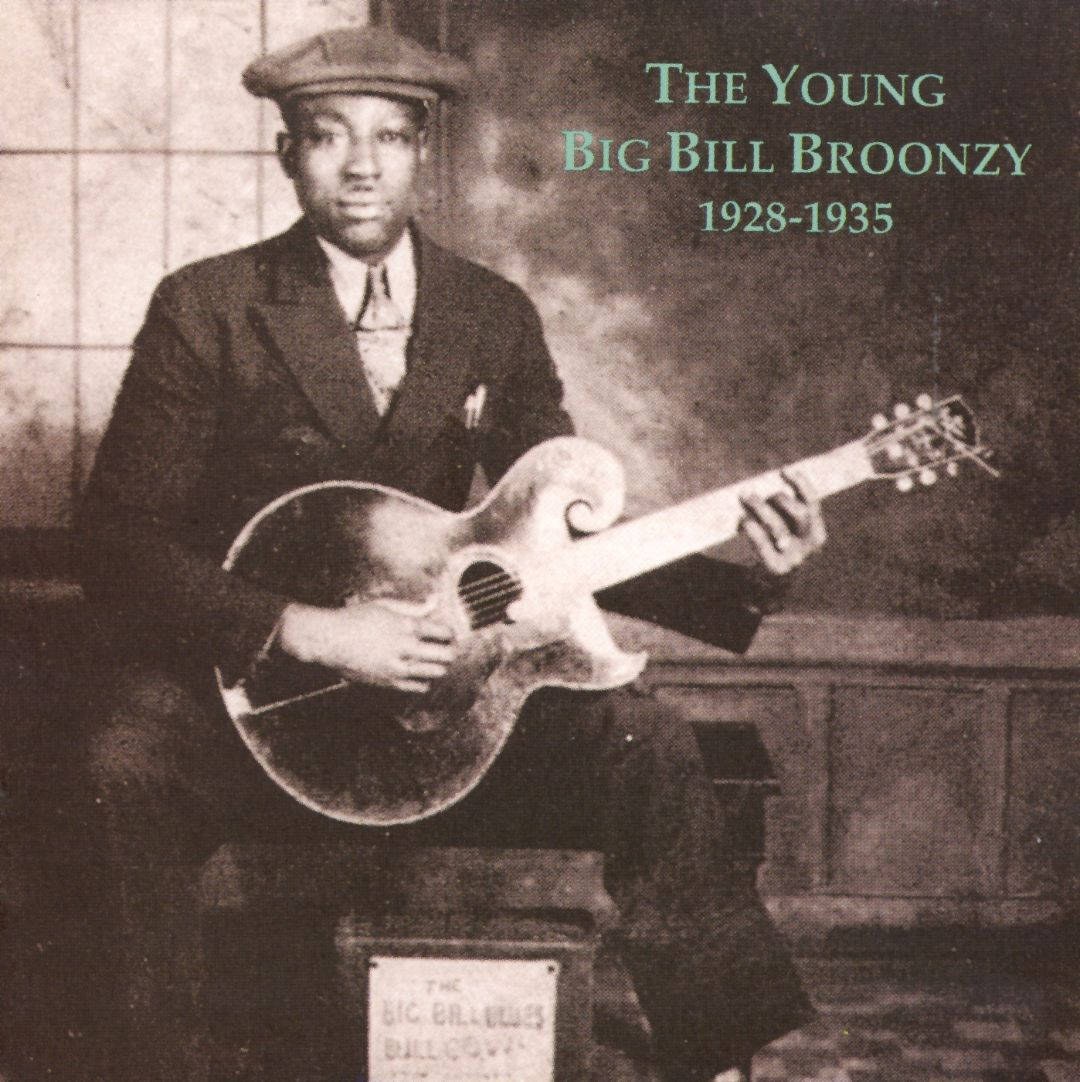 young 桌布 壁紙 — 年輕的Big Bill Broonzy在復古棕褐色調肖像中手持吉他，並有文字疊加。