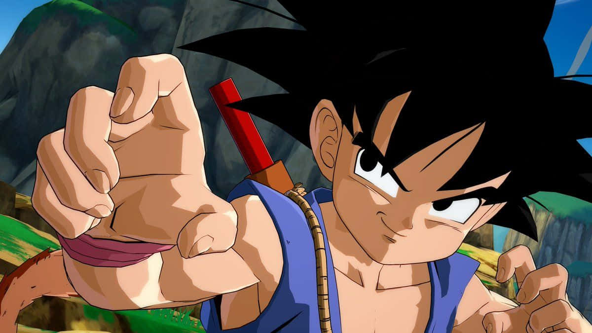 Funny Goku 桌布 壁紙 — 年輕的悟空以動漫風格向前出拳，背景是岩石山脈，充滿強烈決心。
