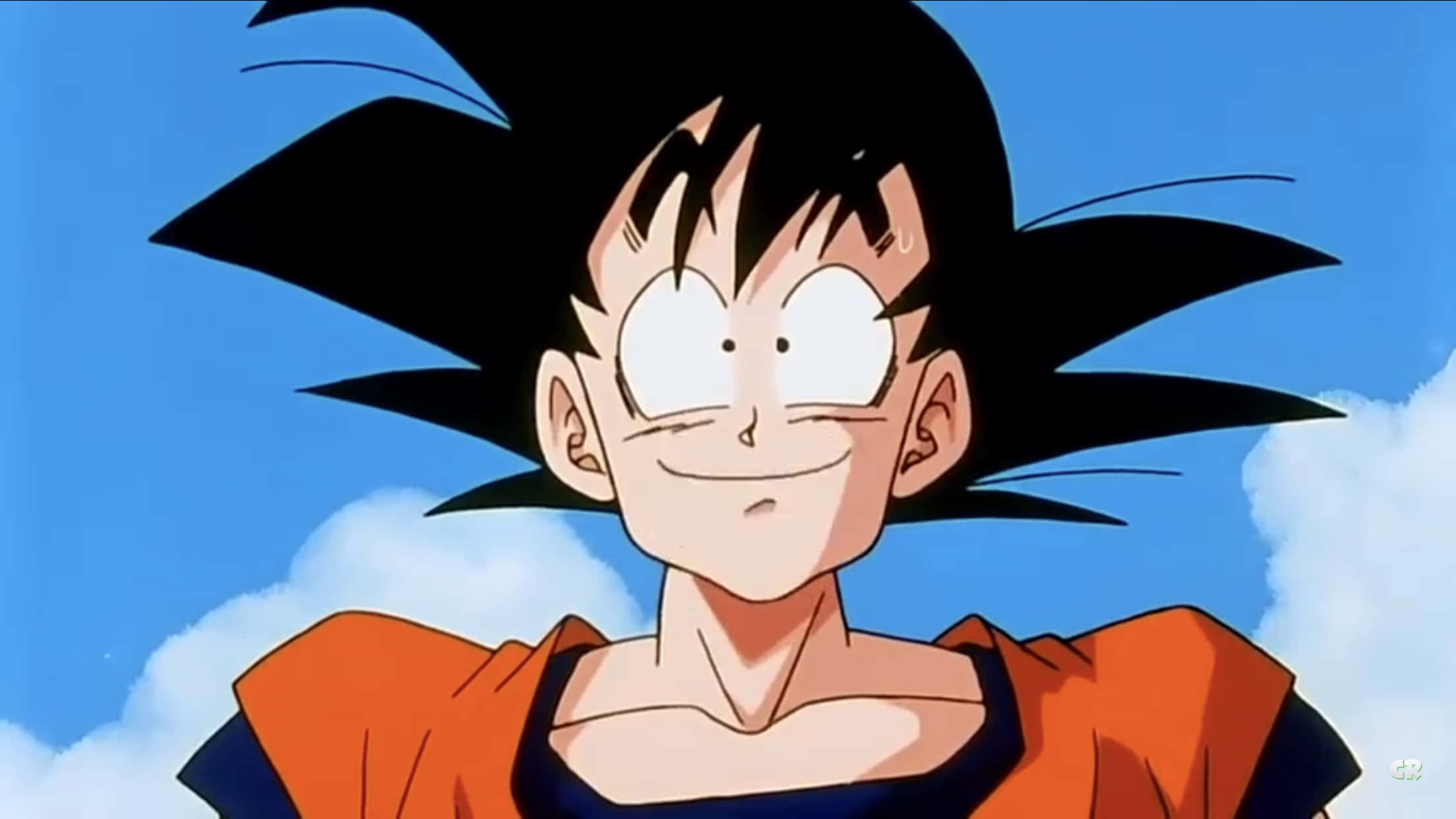 Funny Goku 桌布 壁紙 — 年輕的悟空在明亮的藍天和蓬鬆的白雲背景下自信地微笑。