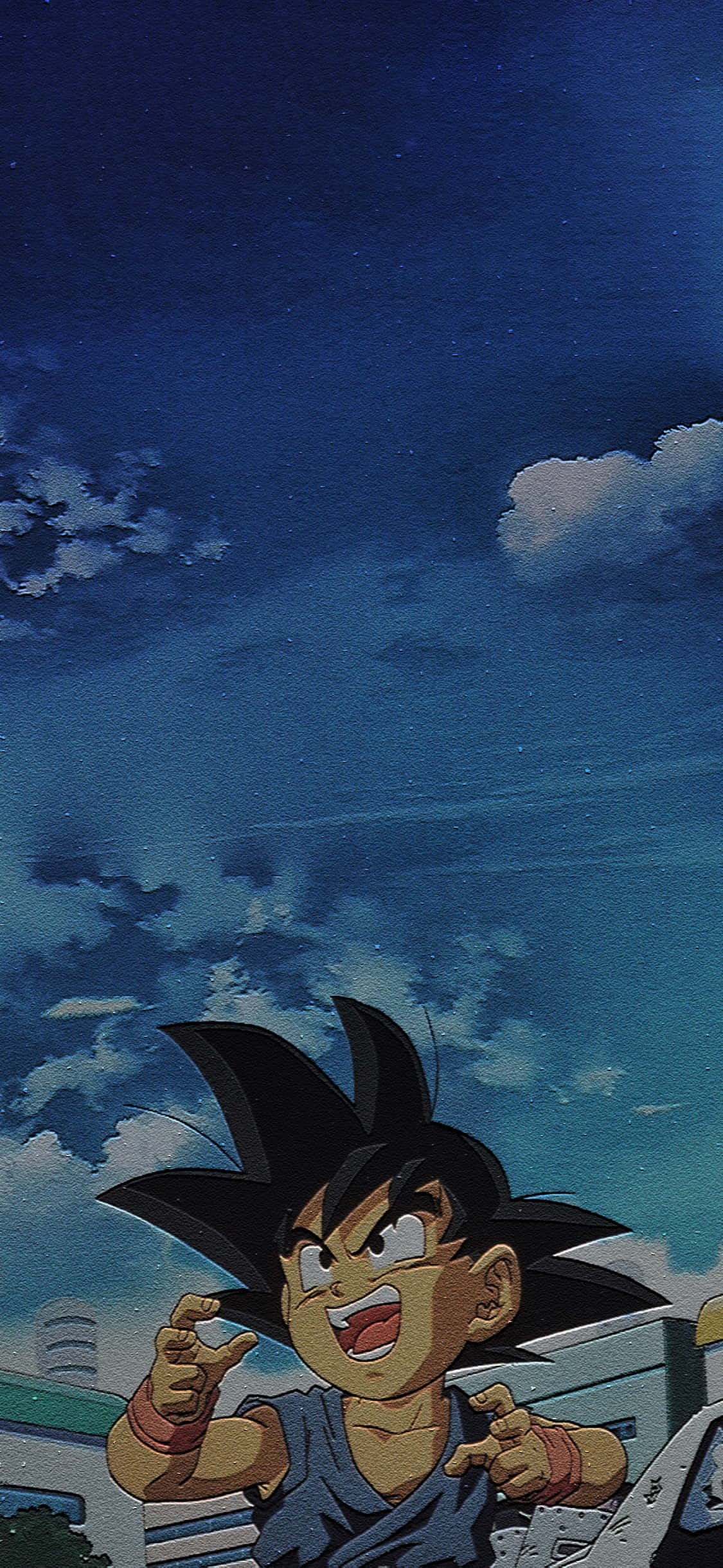 Cool Anime Blue 桌布 壁紙 — 年輕的悟空在繁星點點的暮色天空中，帶著愉快的笑容向上指著，天空中有散落的雲朵。