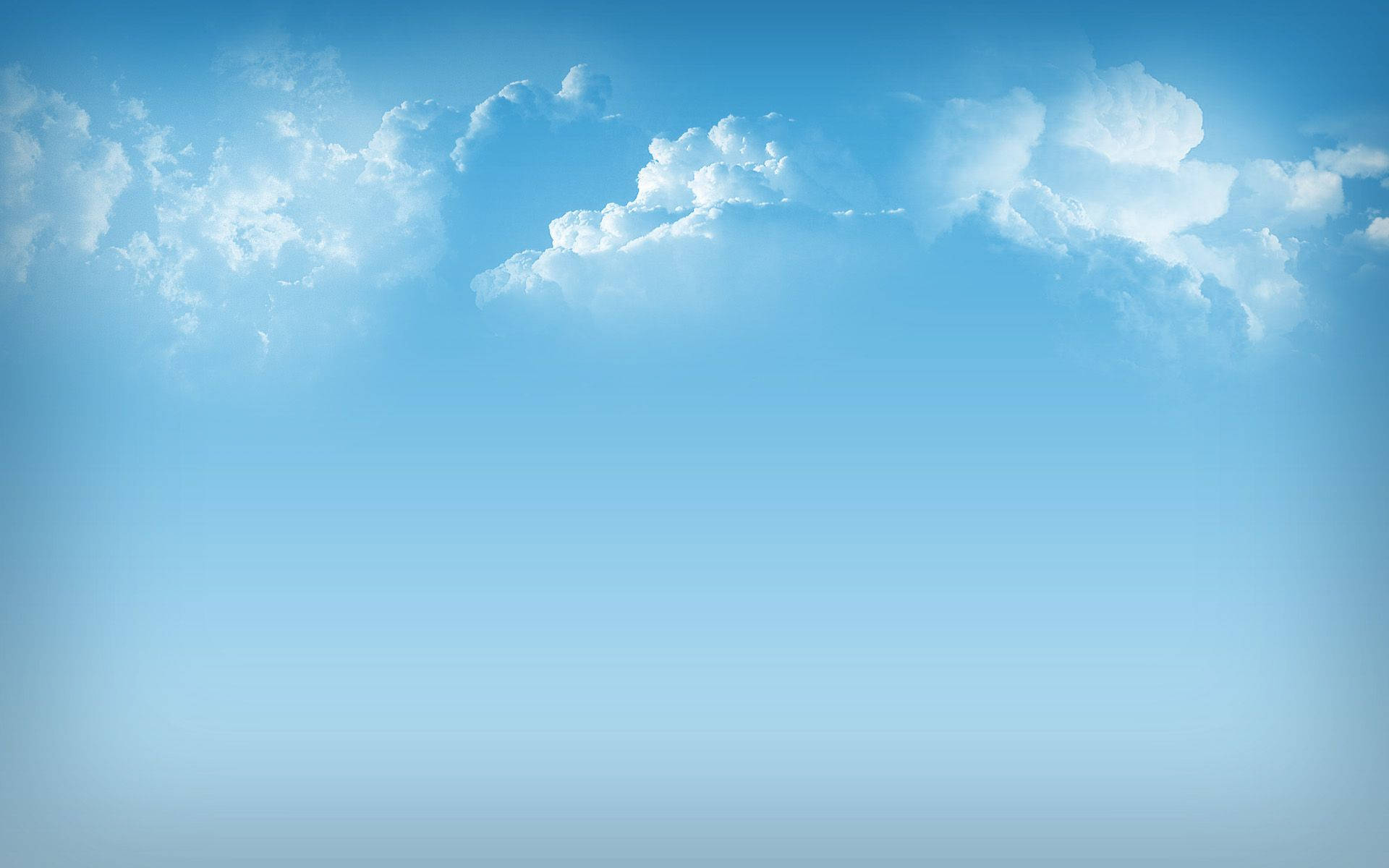 天空 桌布 壁紙 — 廣闊寧靜的天空，蓬鬆的白雲在漸變藍色畫布上飄移。