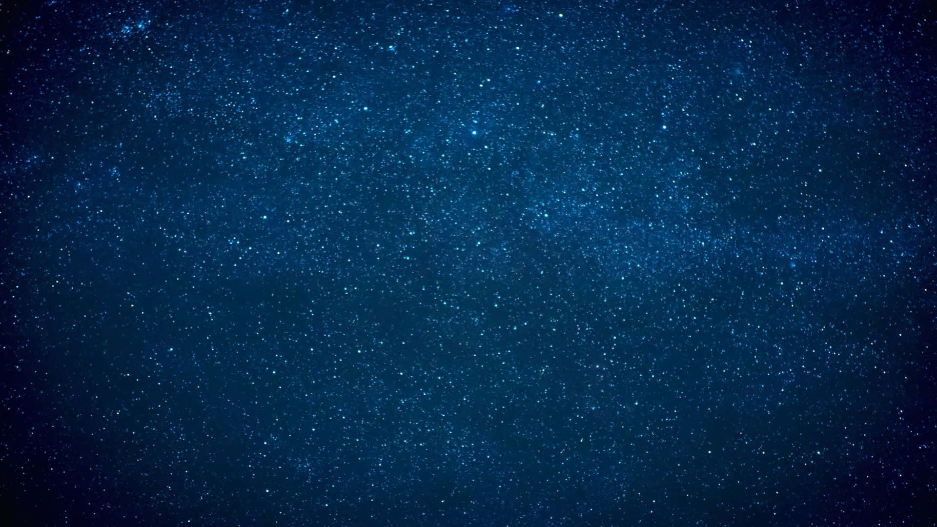 黑夜 桌布 壁紙 — 廣闊深藍夜空，點綴無數閃爍星星，營造寧靜宇宙背景。
