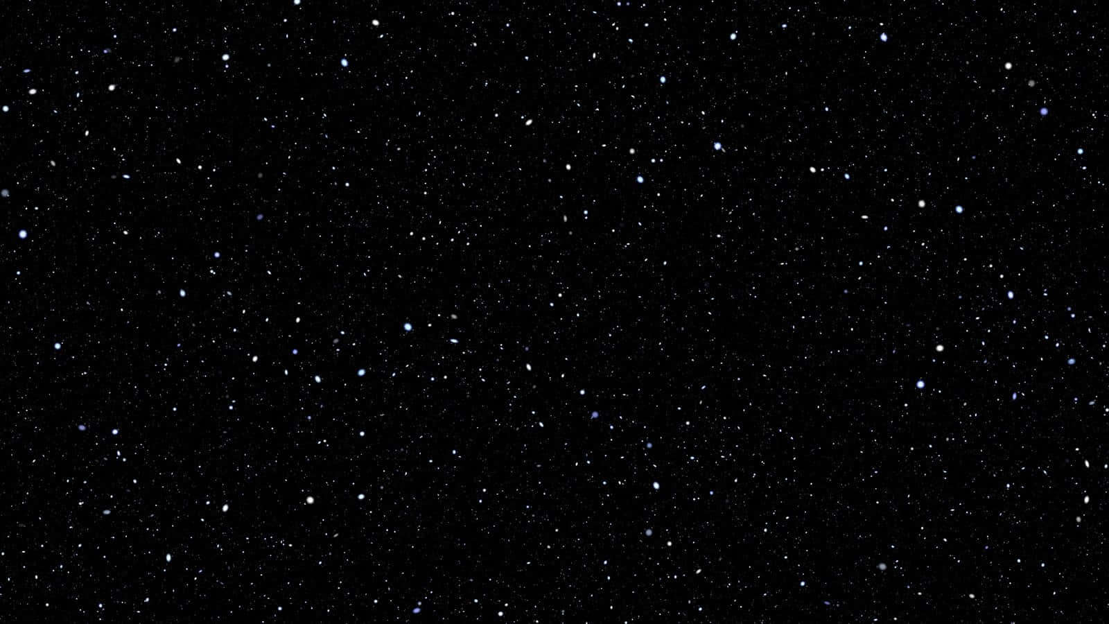 images 桌布 壁紙 — 廣闊深邃的黑色夜空，點綴著無數閃爍的星星和微弱的星雲。