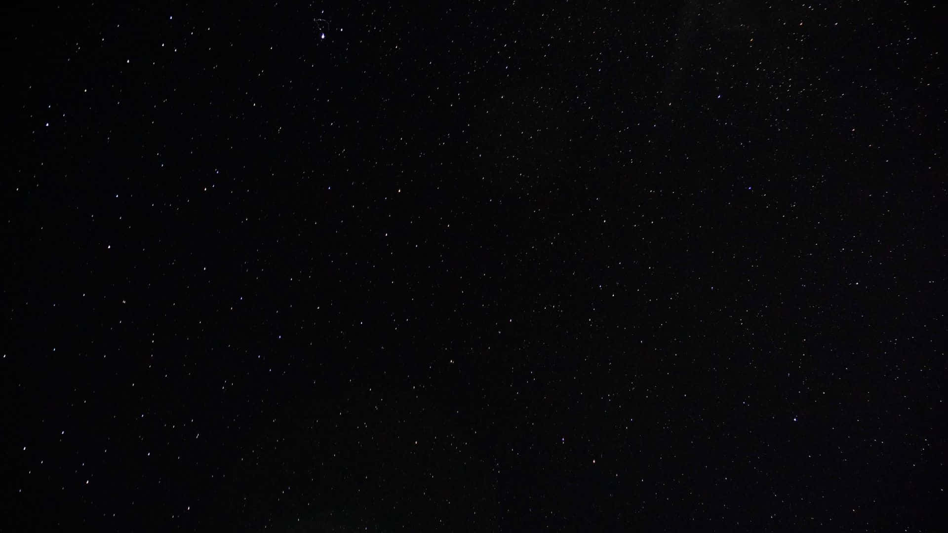 黑夜 桌布 壁紙 — 廣闊漆黑的夜空，無數閃爍的星星散落在虛空中。