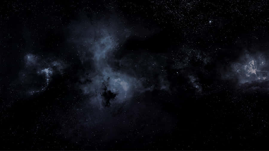 1366x768 Amoled 桌布 壁紙 — 廣闊的宇宙場景，充滿黑暗太空、發光的藍色星雲和散落的星星，營造出神秘的天體景觀。