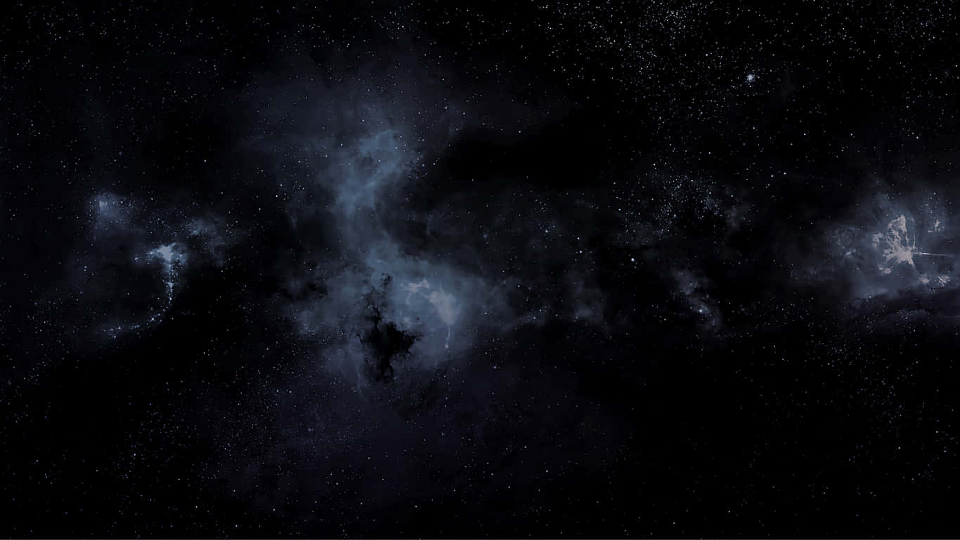 1366x768 Amoled 桌布 壁紙 — 廣闊的宇宙場景，深藍色漩渦星雲和無數閃爍的星星，襯托著深邃的黑色虛空。