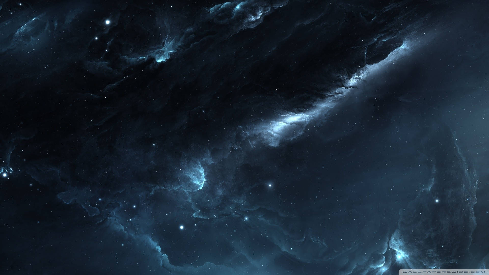 1024x576 桌布 壁紙 — 廣闊的宇宙星雲在深空中以深藍色和發光高光在星場中旋轉。