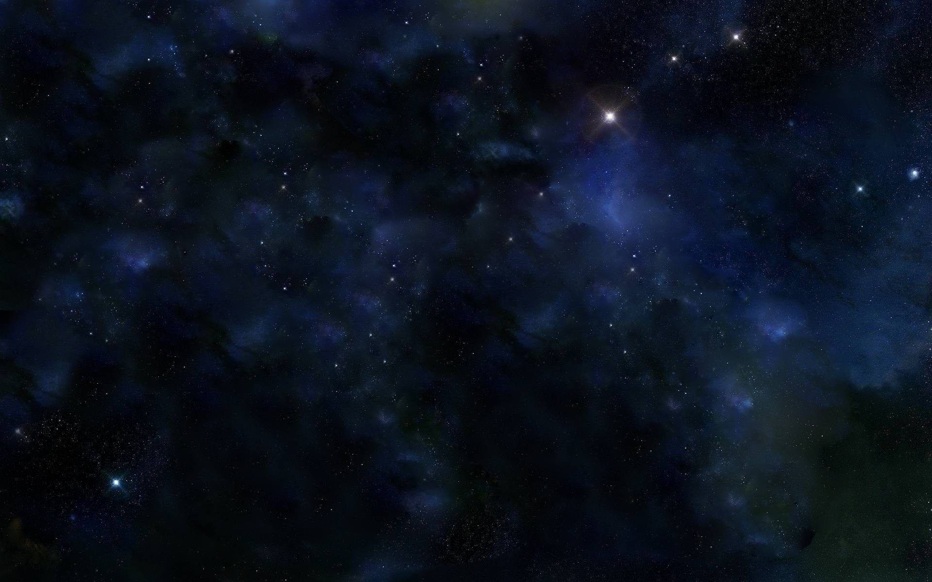 夜空 桌布 壁紙 — 廣闊的宇宙空間，充滿了發光的星星和旋轉的星雲，呈現深藍色和紫色。