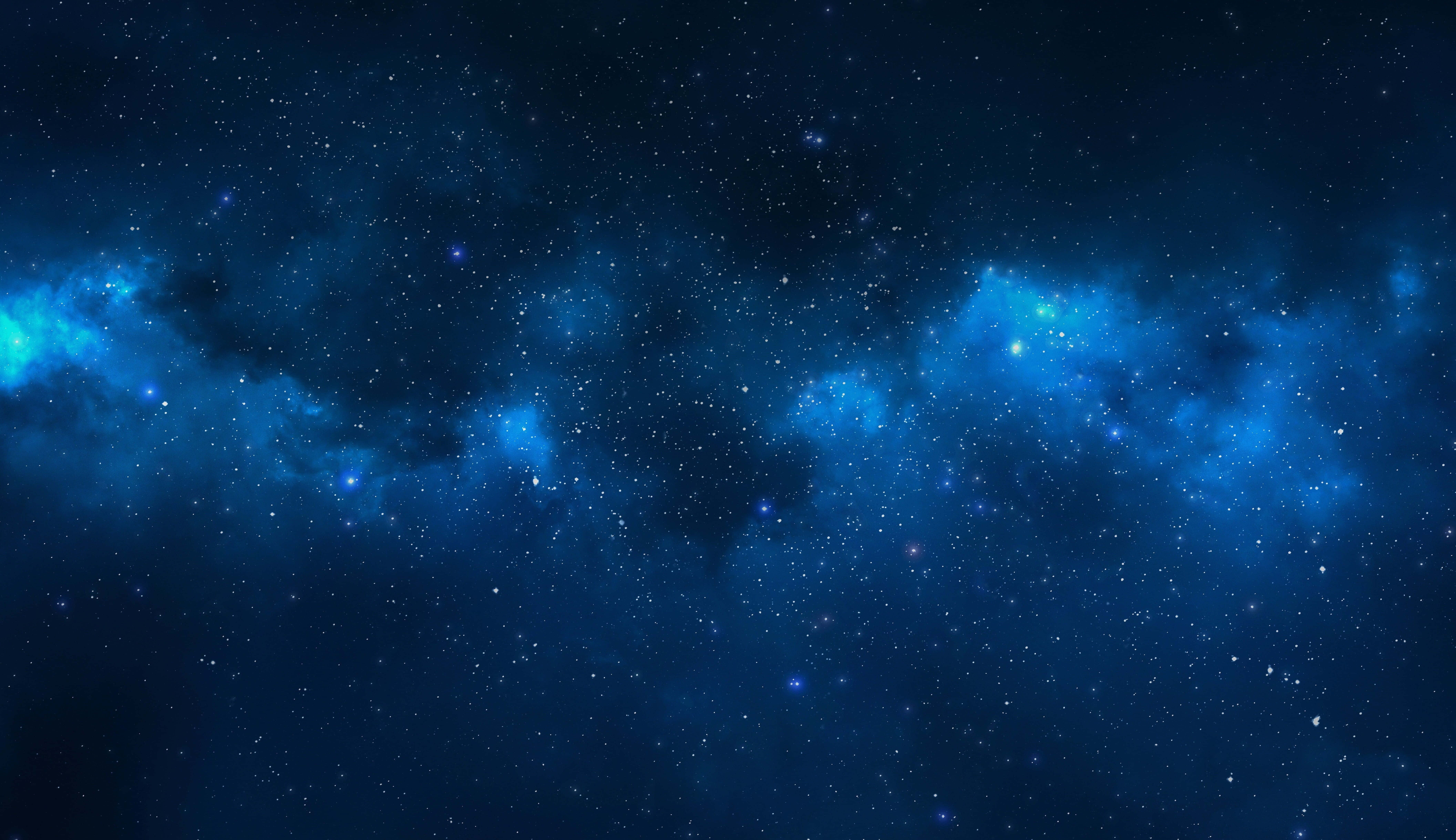 Space Nebula 桌布 壁紙 — 廣闊的宇宙空間，充滿了發光的藍色星雲和無數閃爍的星星，映襯著深邃的靛藍虛空。