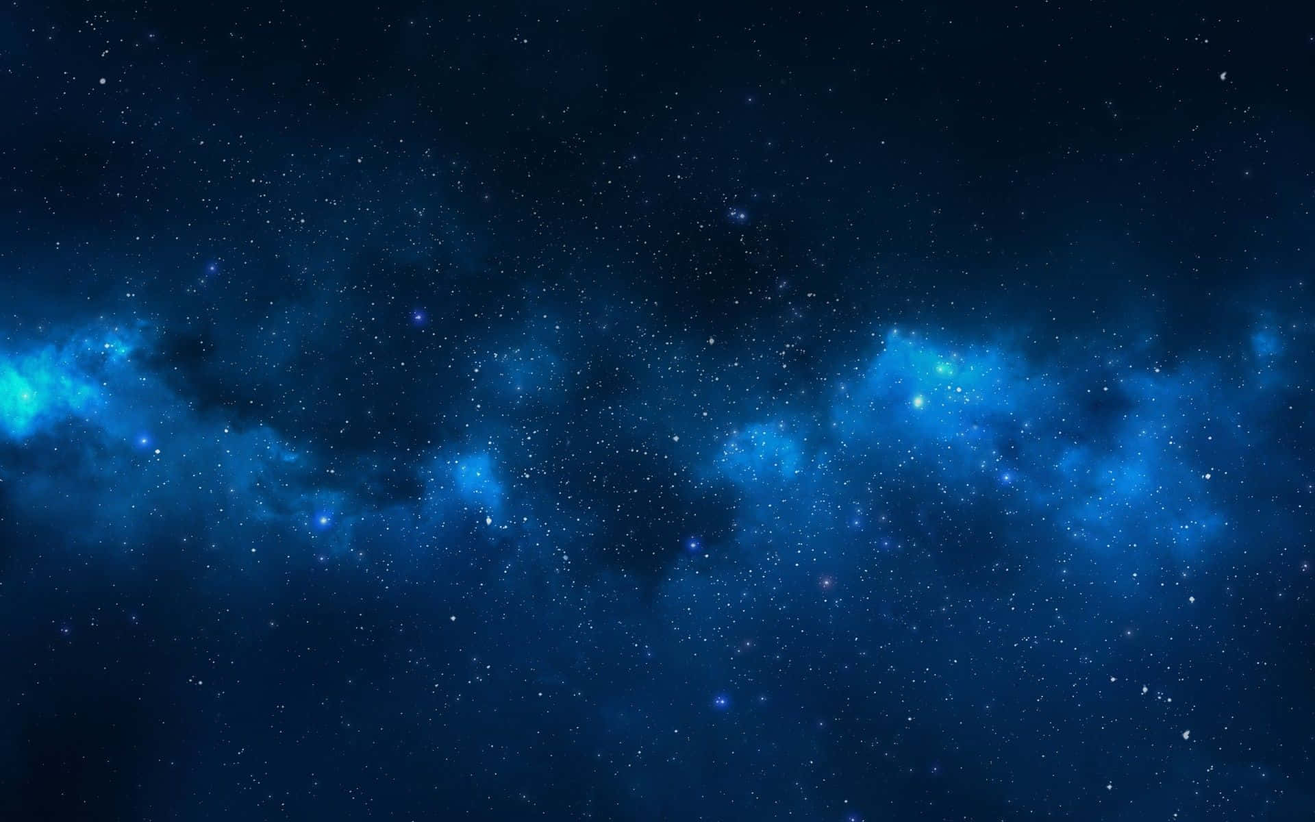 桌布 壁紙 — 廣闊的宇宙空間，充滿了發光的藍色星雲和無數閃爍的星星，映襯著深邃的靛藍虛空。