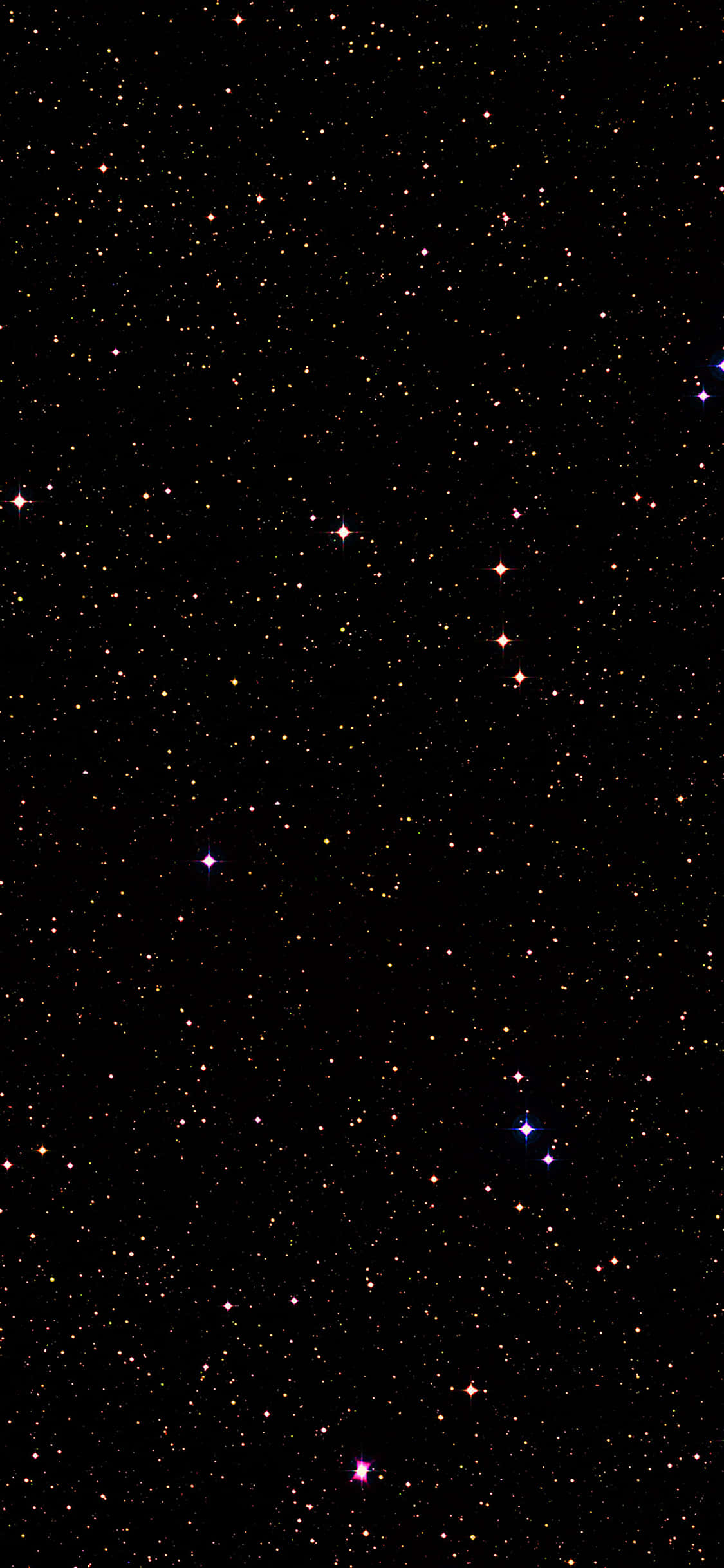 彩色動圖 桌布 壁紙 — 廣闊的星場，有各種顏色閃爍的星星，映襯著深邃的黑色宇宙虛空。