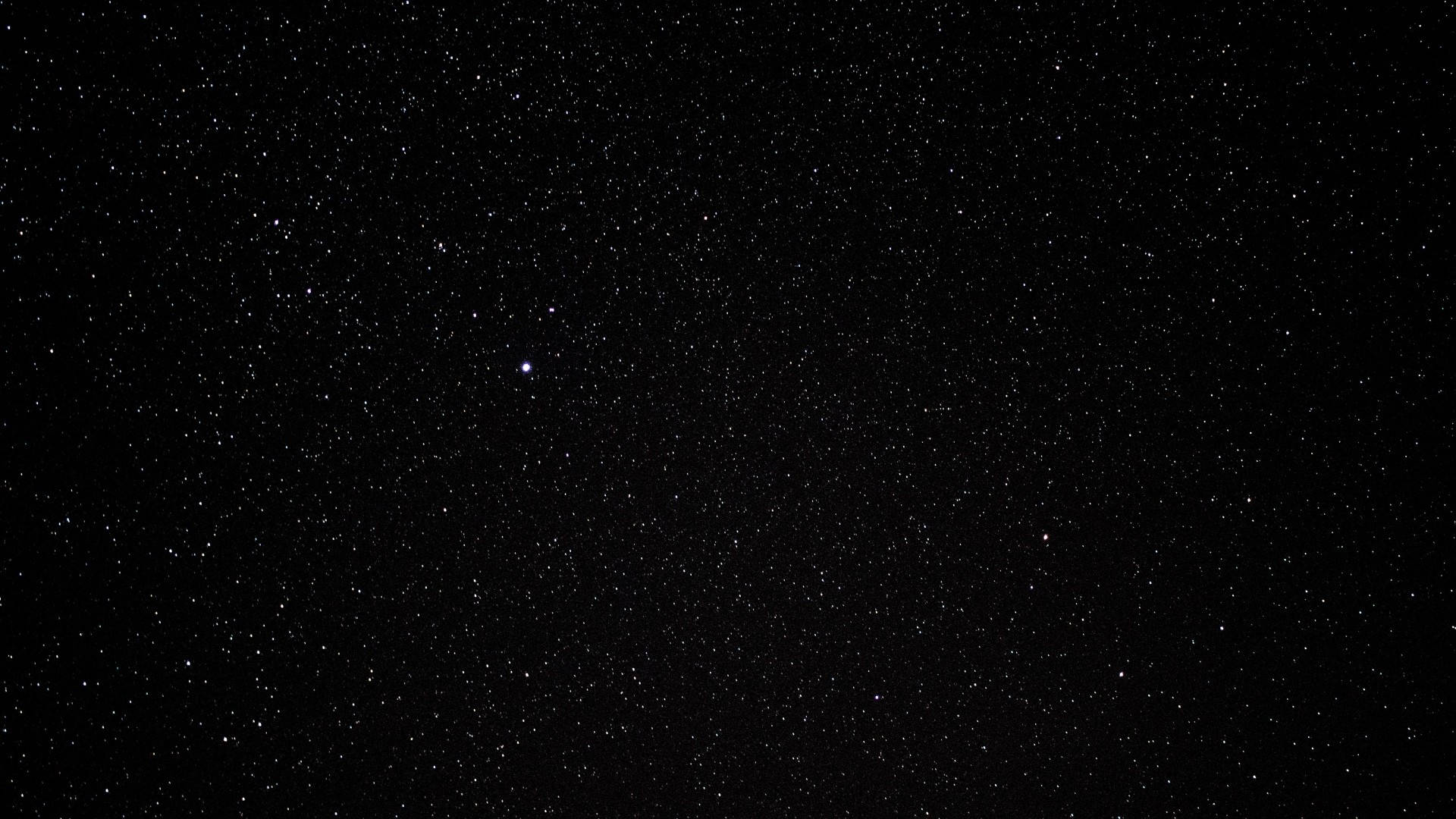 閃爍 桌布 壁紙 — 廣闊的星空夜空，充滿無數閃爍的星星，映襯著深邃的黑色虛空。
