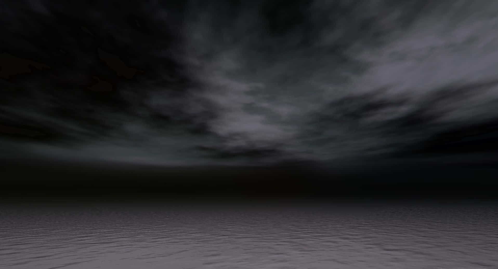 Grey Texture 桌布 壁紙 — 廣闊的深灰色天空充滿旋轉的暴風雲，在昏暗的光線下籠罩著平坦的紋理灰色表面。