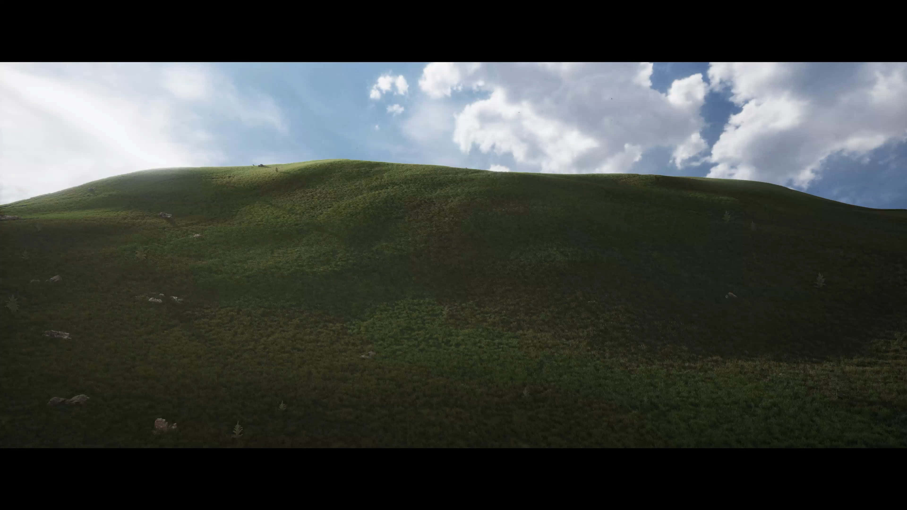 The Battle Of Naboo 桌布 壁紙 — 廣闊的陽光普照的綠色山坡在明亮的藍天下緩緩傾斜，點綴著蓬鬆的白雲。