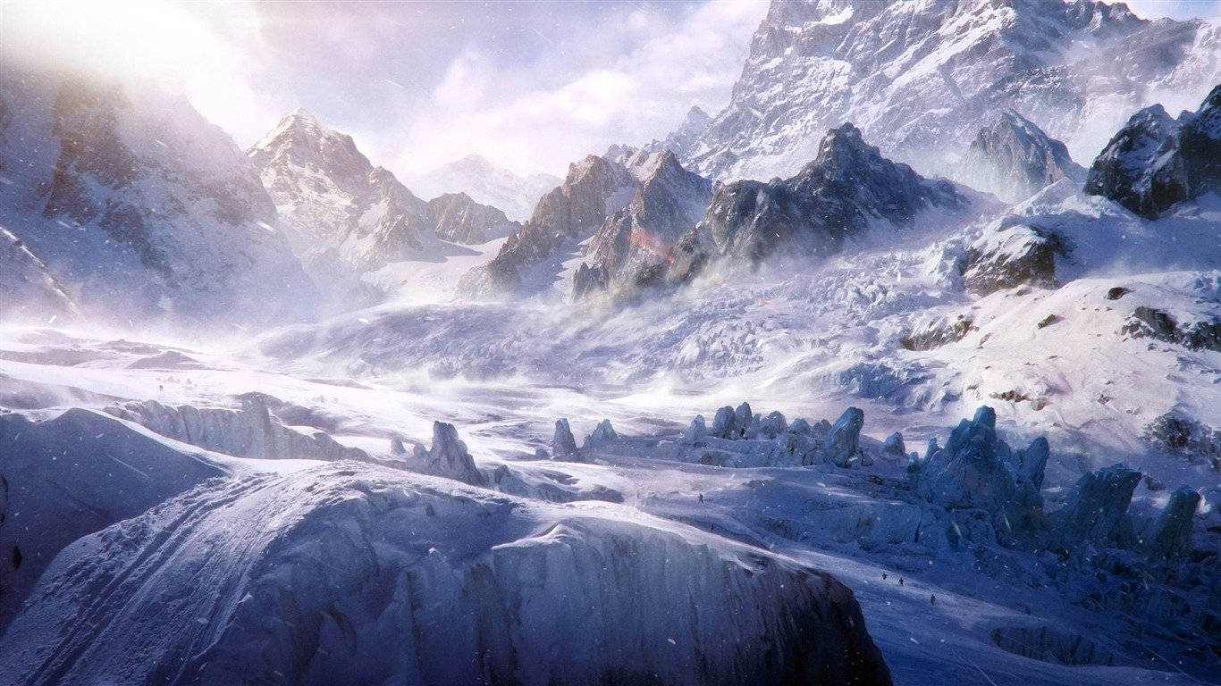 自然 桌布 壁紙 — 廣闊的雪山山脈，有鋸齒狀山峰和冰川，在明亮的陽光下，柔和的光線灑在冰凍的景觀上。