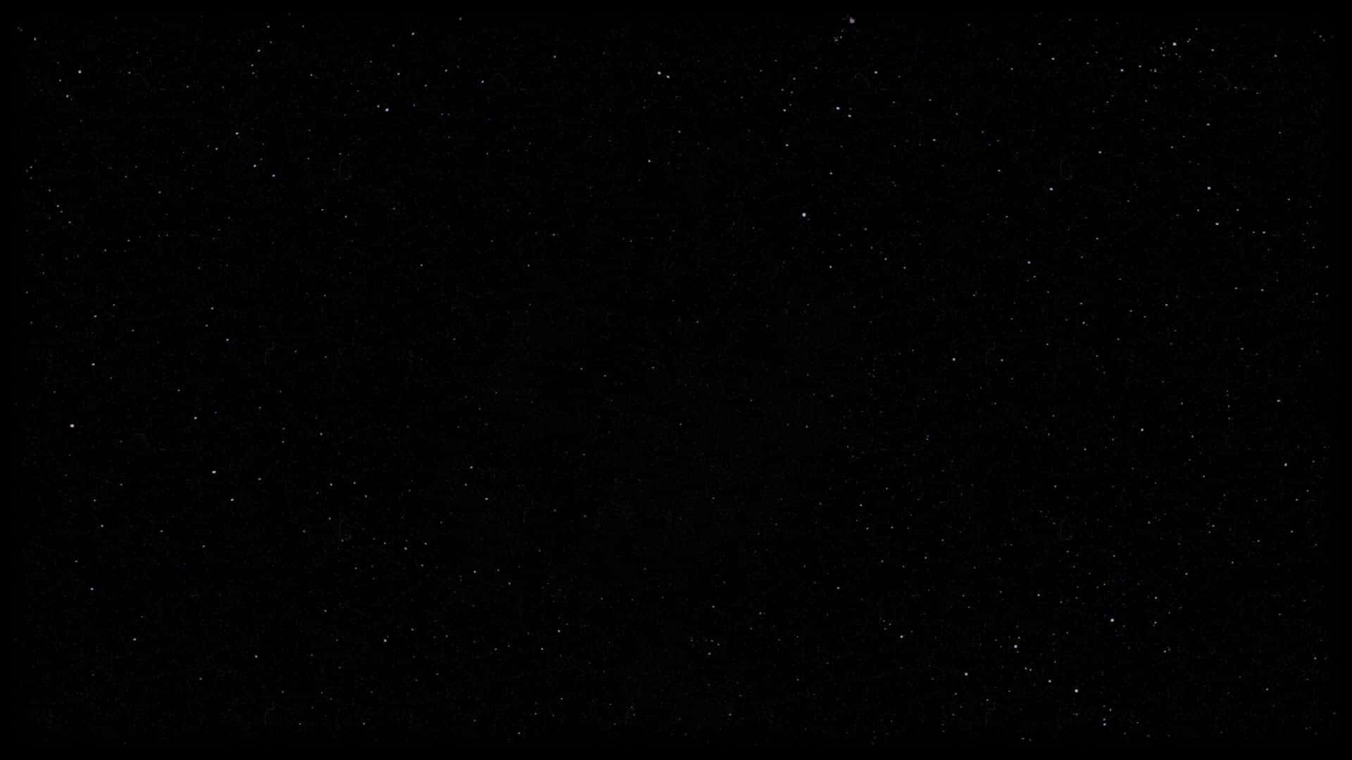 Stars 桌布 壁紙 — 廣闊的黑暗夜空，無數細小的白色星星散落在黑色虛空中。