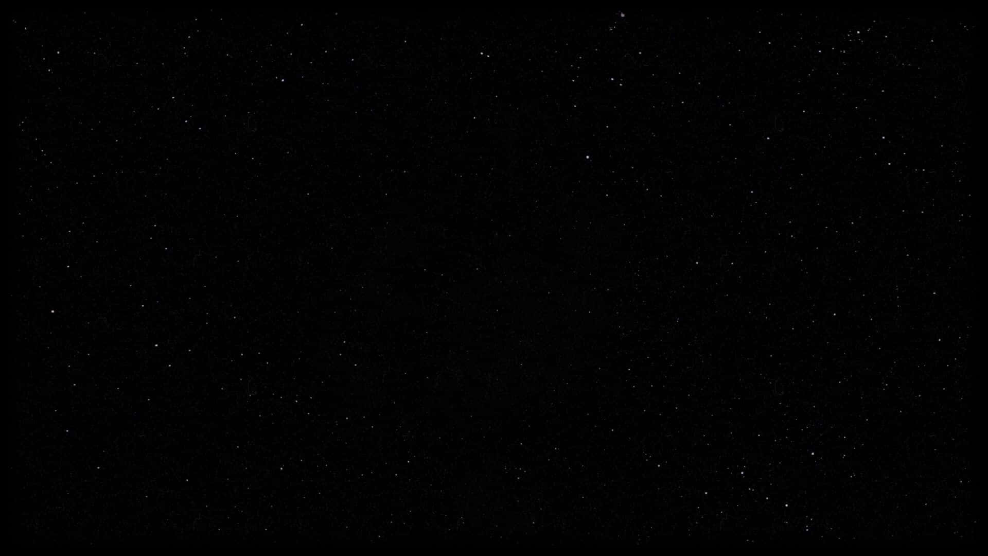 Stars 桌布 壁紙 — 廣闊的黑色天空中點綴著無數細小的白色星星，營造出寧靜的宇宙場景。