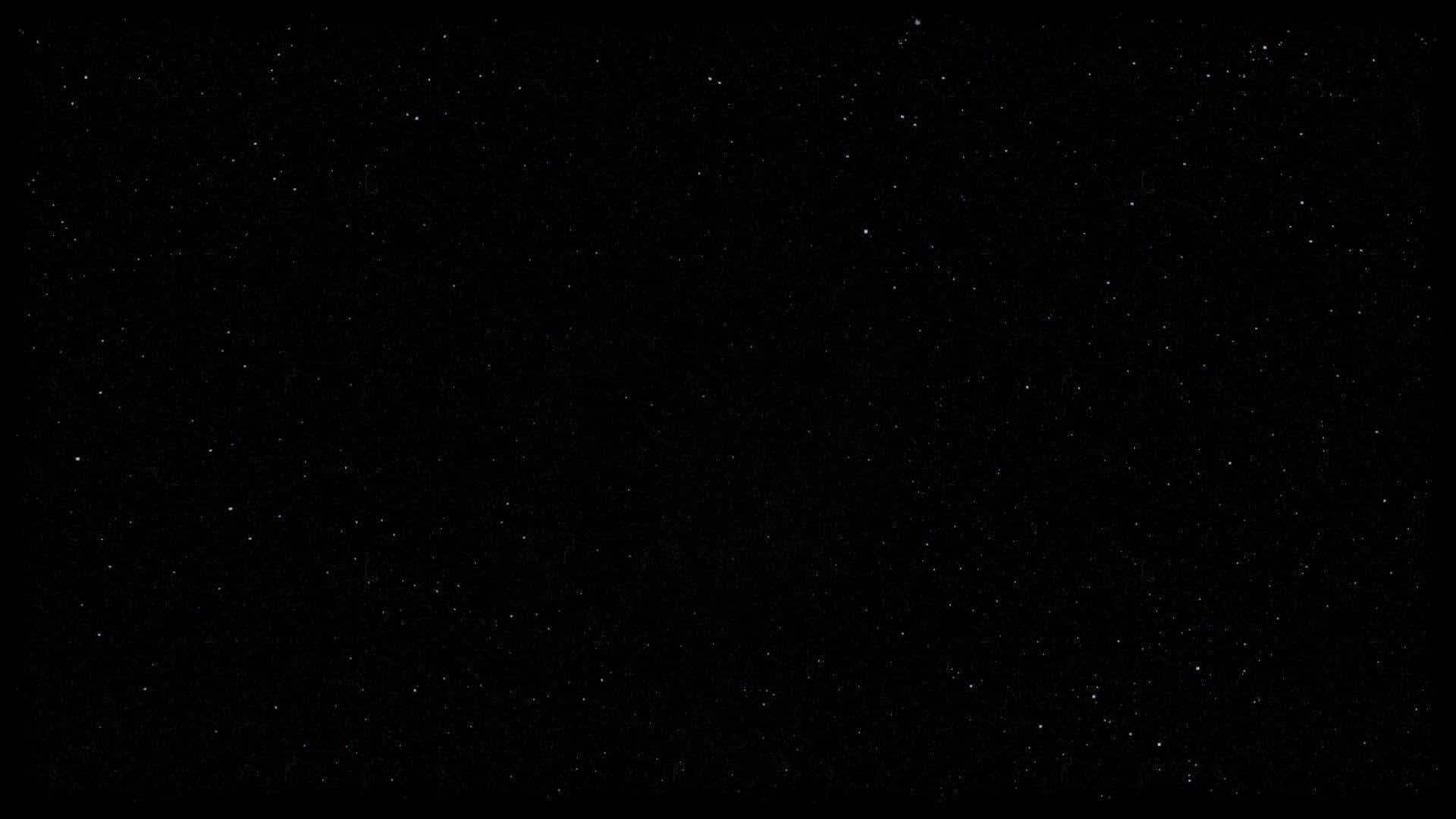Black And White Aesthetic Pc 桌布 壁紙 — 廣闊的黑色天空中點綴著無數細小的白色星星，營造出寧靜的宇宙場景。