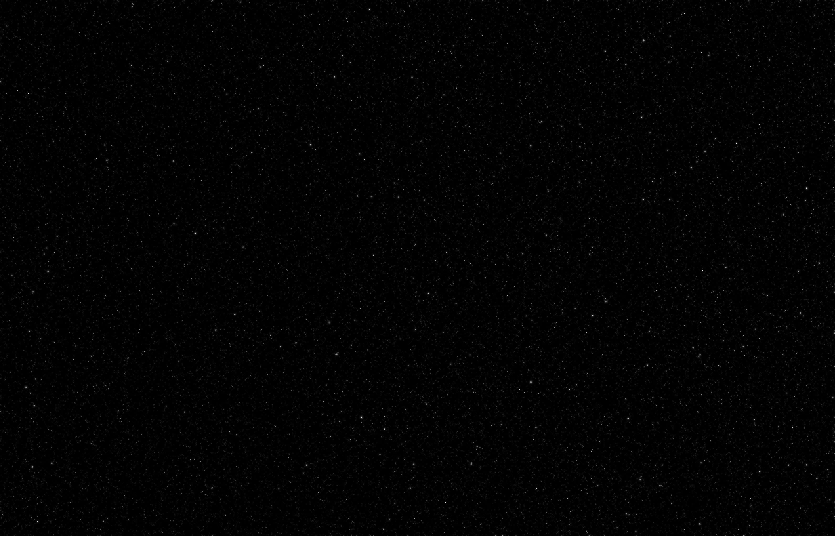 Dark Sky 桌布 壁紙 — 廣闊的黑色天空中點綴著無數細小的白色星星，營造出寧靜的宇宙空間。