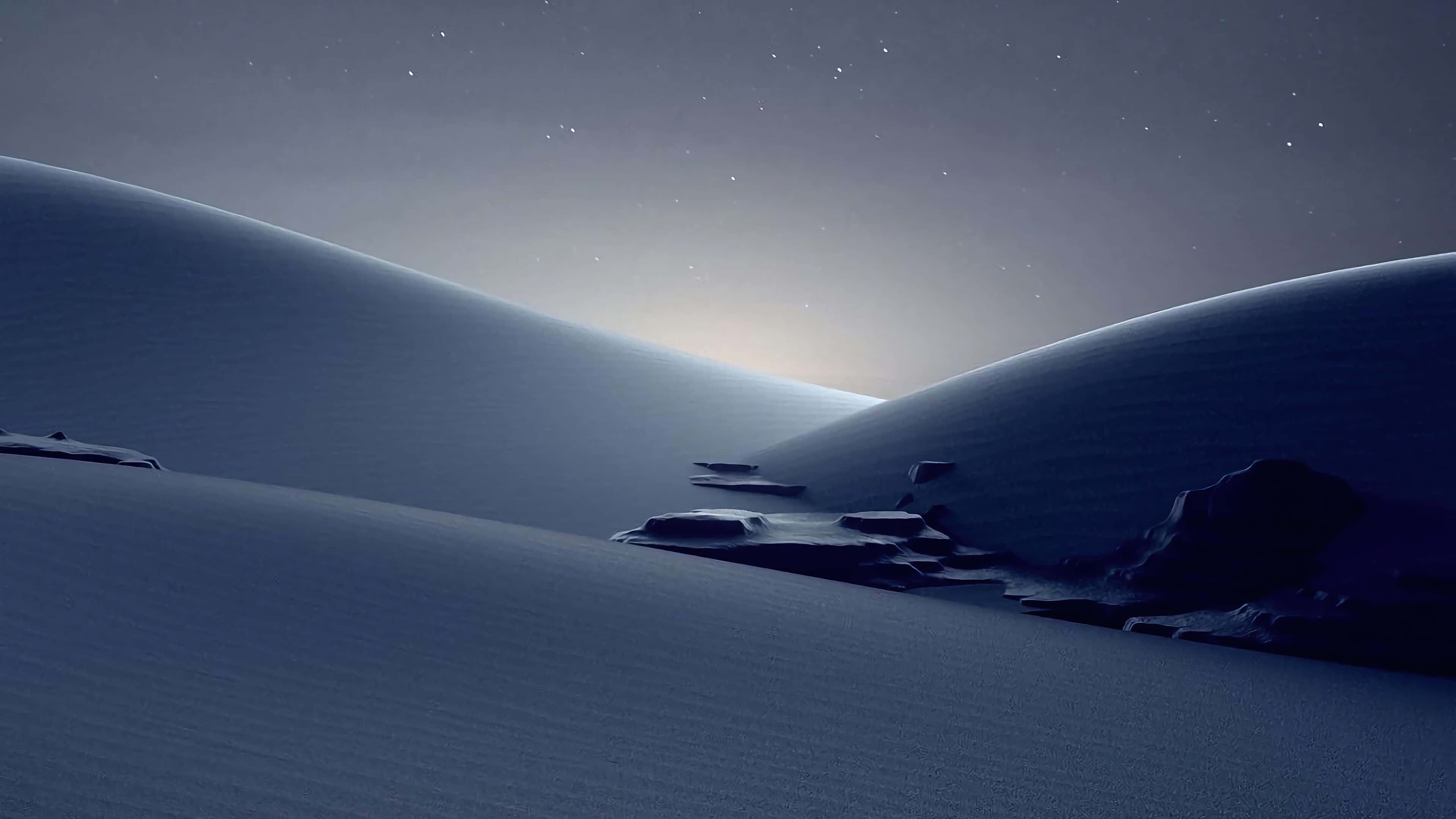 風景 桌布 壁紙 — 廣闊雪覆沙丘上寧靜的星空，微妙的岩石形成投下柔和陰影。