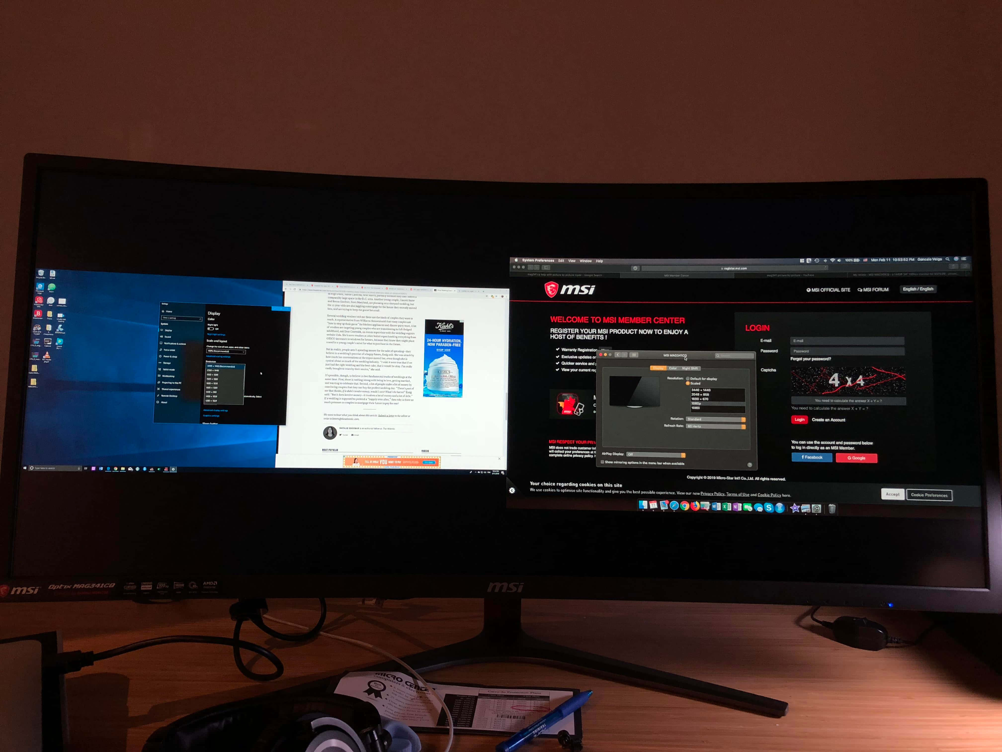 msi 2560x1080 桌布 壁紙 — 弧形MSI顯示器在昏暗燈光下於木桌上顯示多個視窗，包括MSI Center和瀏覽器。