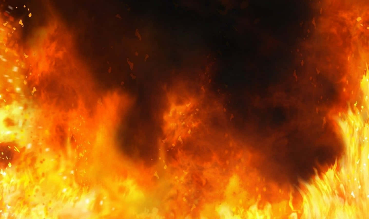 Cool Fire 桌布 壁紙 — 強烈的火焰咆哮，伴隨著鮮豔的橙色、黃色和黑色煙霧在動態的火災爆炸中旋轉。