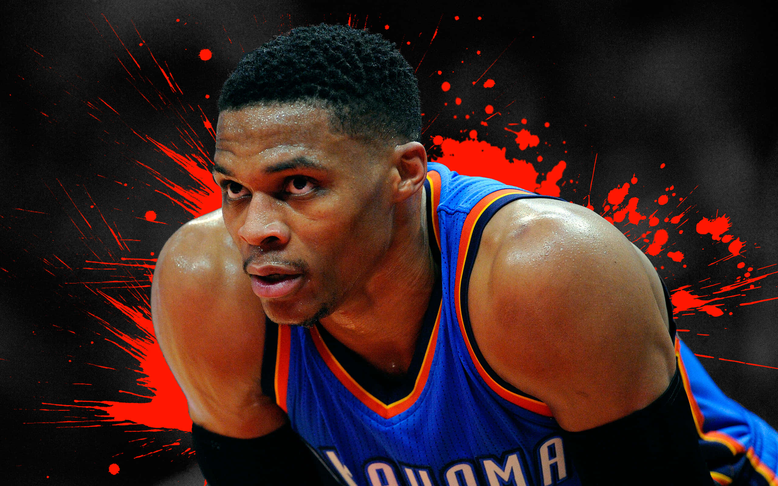 籃球 桌布 壁紙 — 強烈的籃球運動員穿著藍色奧克拉荷馬球衣，在深色背景上帶有紅色潑濺效果。