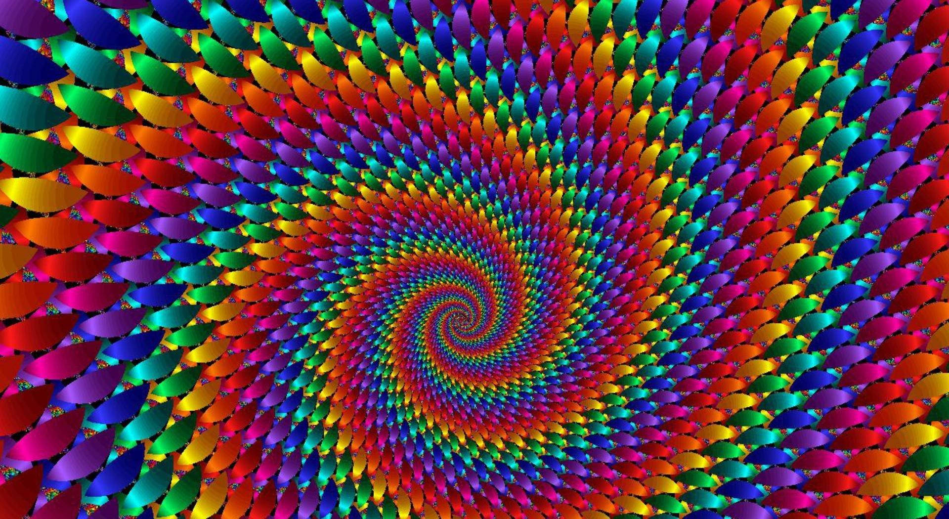 Spiral 桌布 壁紙 — 彩虹色淚滴形狀的迷人螺旋在中心匯聚成催眠般的漩渦。