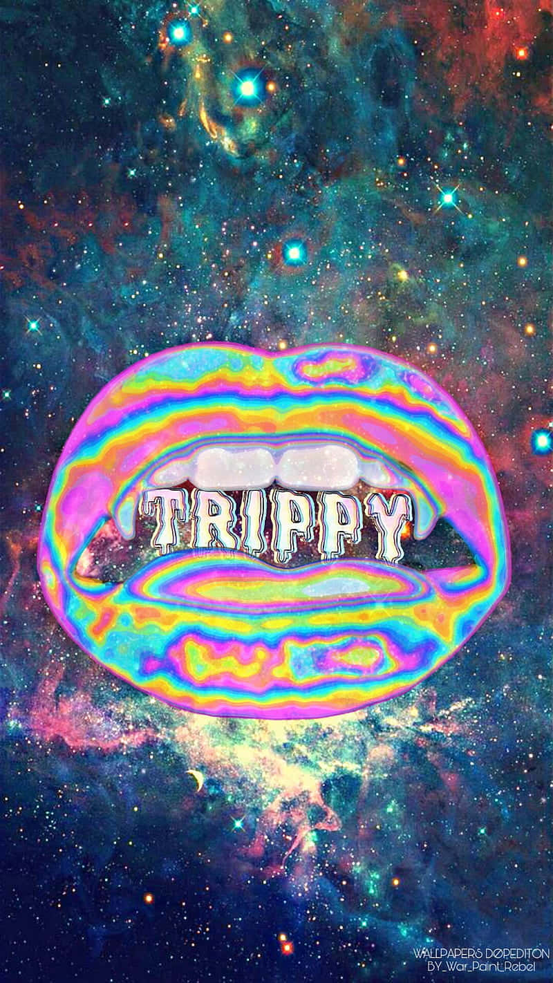Trippy Galaxy 桌布 壁紙 — 彩虹色虹彩嘴唇帶有 'TRIPPY' 文字，漂浮在充滿星星和星雲的宇宙銀河背景上。