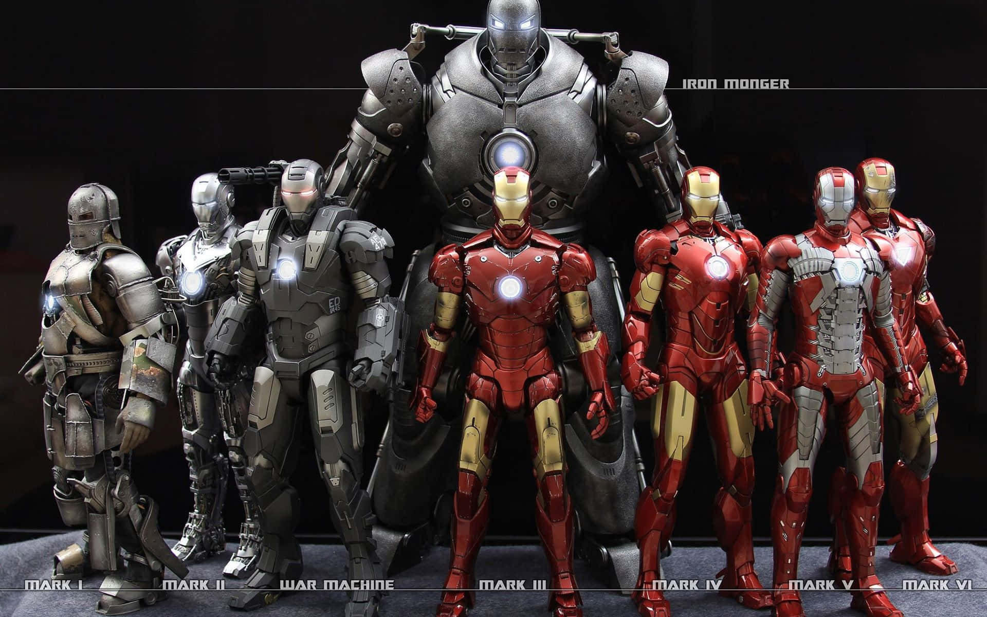 iron man 3 桌布 壁紙 — 從Mark I到Mark VI的鋼鐵人戰衣及戰爭機器在黑暗的攝影棚中展示。