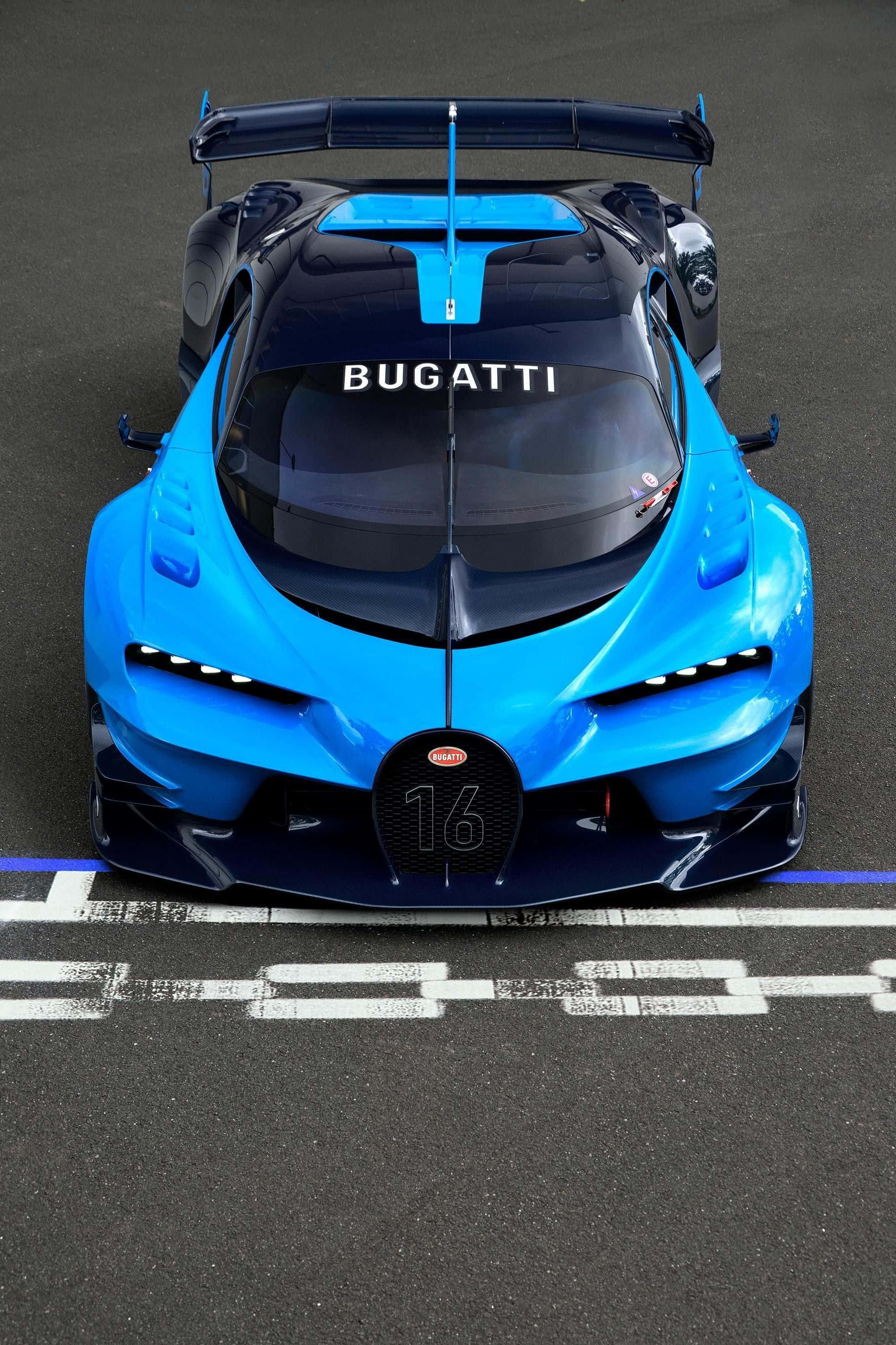 Bugatti Phone 桌布 壁紙 — 從上往下看，一輛鮮藍色的布加迪賽車，編號16，停在賽道格子上。