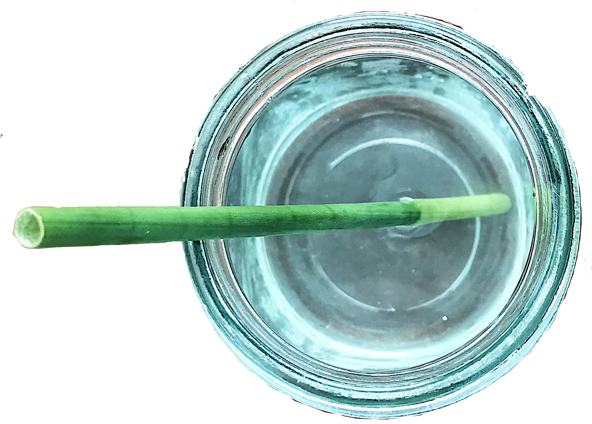 straw 桌布 壁紙 — 從上方俯瞰，一個綠色吸管漂浮在裝滿水的透明玻璃罐中，背景為黑色。