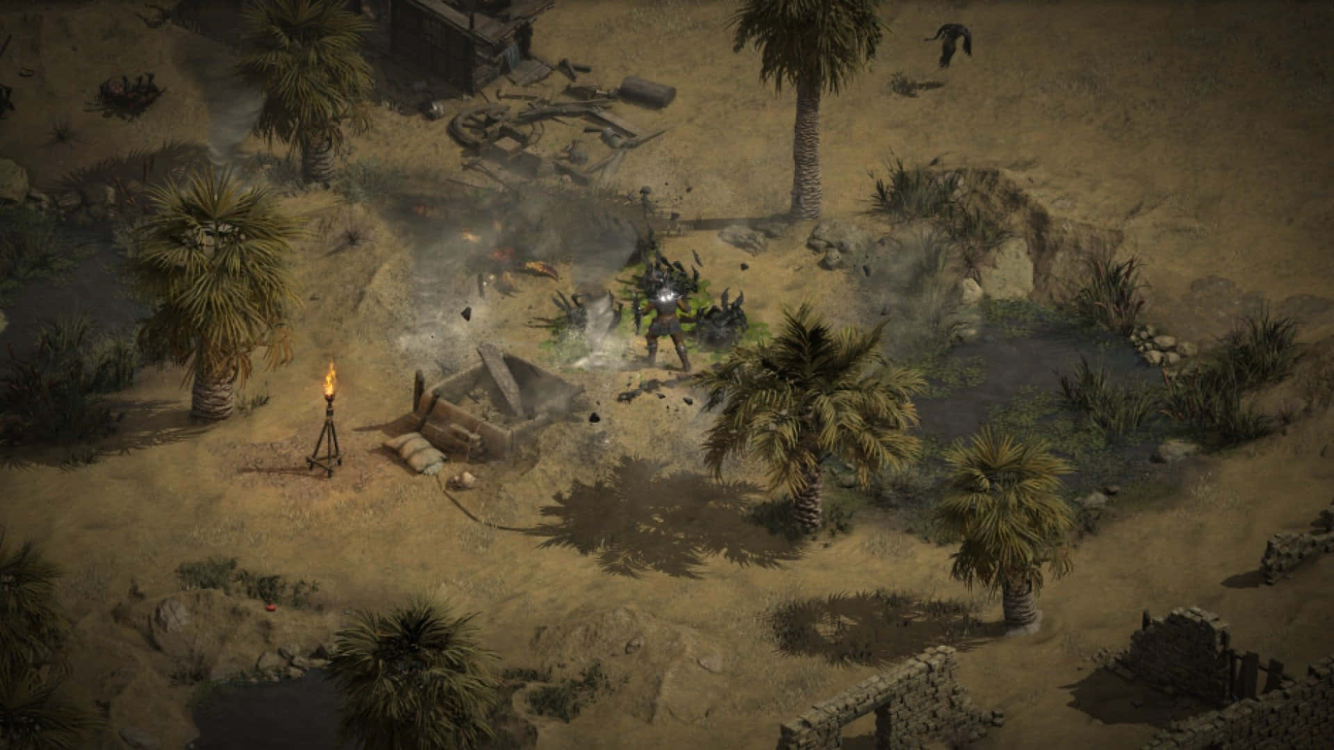 Diablo 2 Resurrected 桌布 壁紙 — 從上方俯瞰，一名孤獨的戰士在荒涼的沙漠營地中與怪物戰鬥，營地裡有棕櫚樹和散落的廢墟。