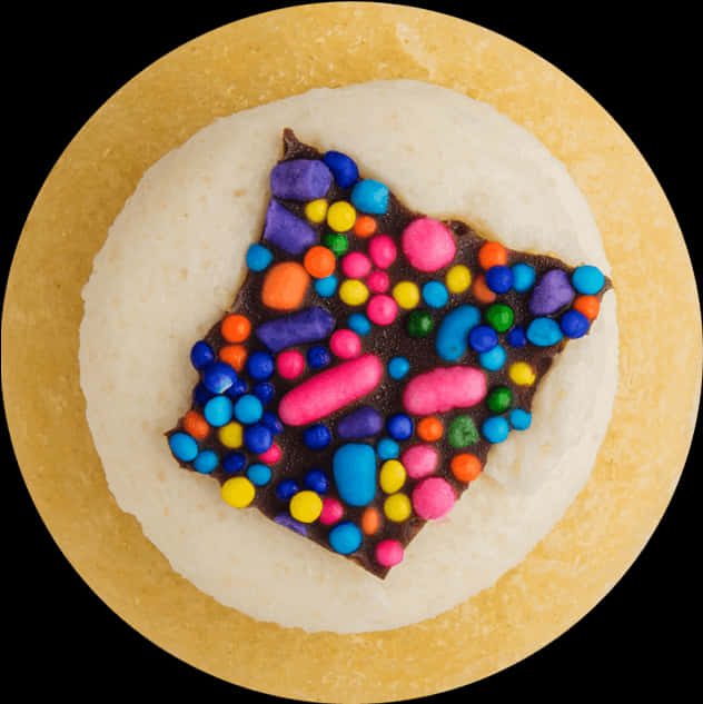 Sprinkles 桌布 壁紙 — 從上方俯瞰一塊餅乾，上面有白色糖霜和色彩繽紛的巧克力及糖果碎。