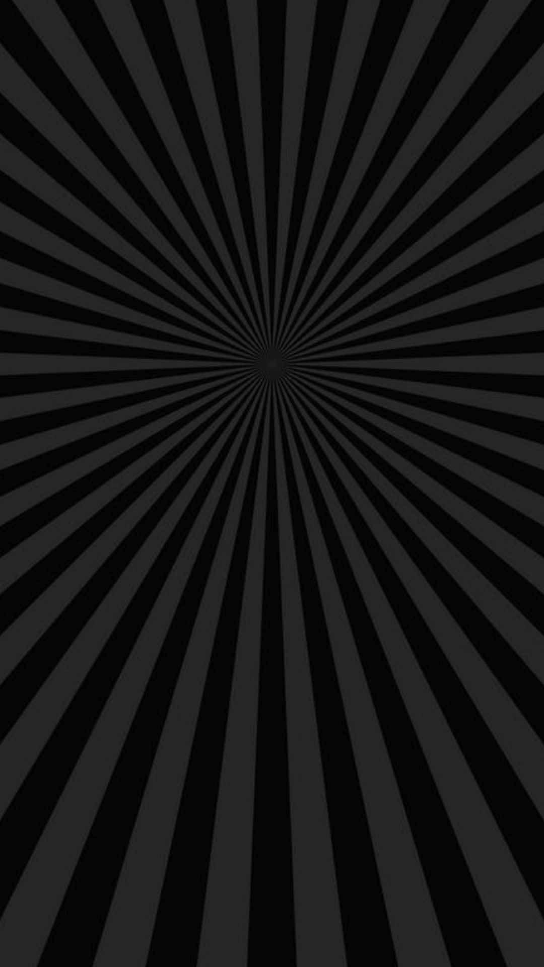 Radial 桌布 壁紙 — 從中心點輻射出的極簡黑白徑向圖案，營造出催眠般的幾何錯覺。