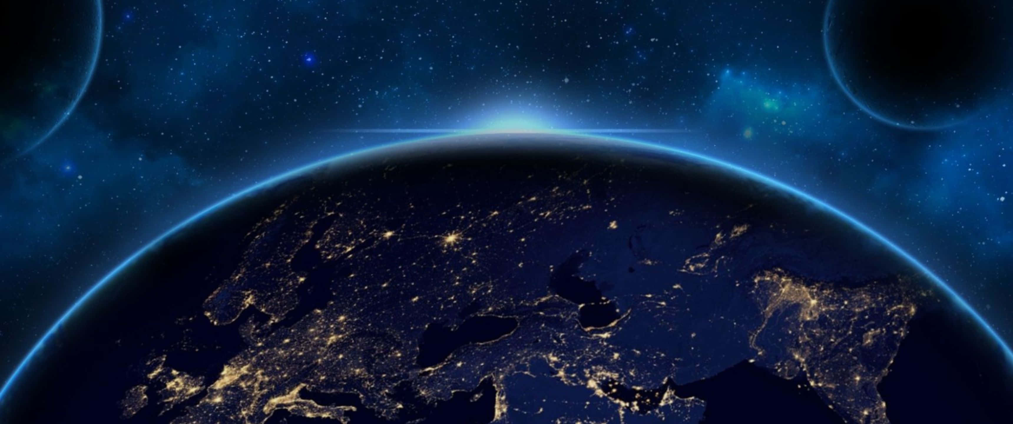 Blue Space 桌布 壁紙 — 從太空俯瞰地球夜晚的壯麗景色，城市燈光閃爍，星空宇宙背景。