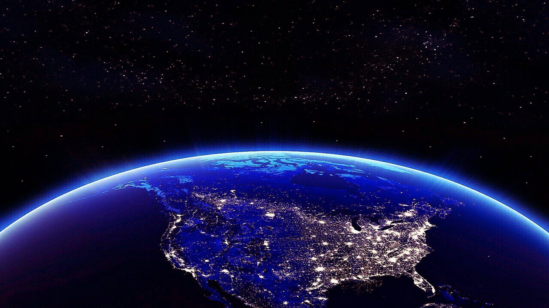夜晚的地球，閃爍的城市燈光和星星 — 4K筆電壁紙 壁紙