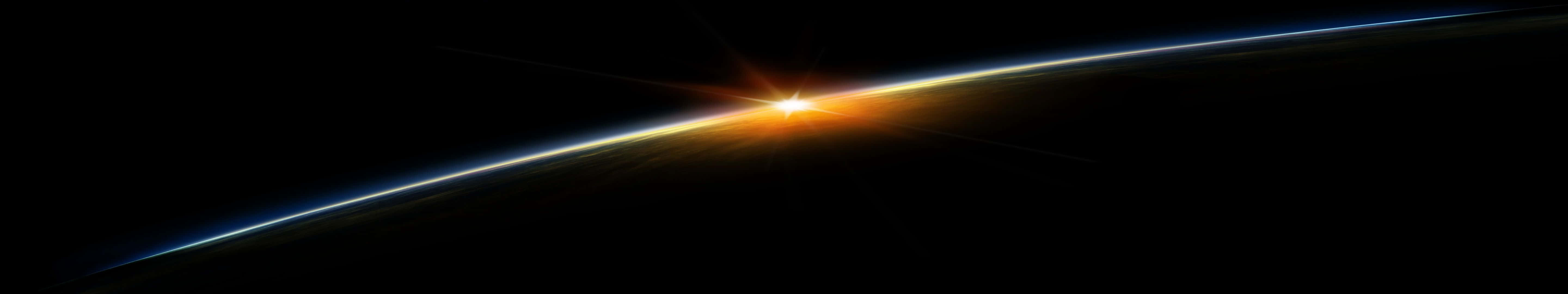 太空 桌布 壁紙 — 從太空俯瞰地球彎曲地平線上的日出，壯麗景色，帶有發光的橙色和藍色大氣帶。