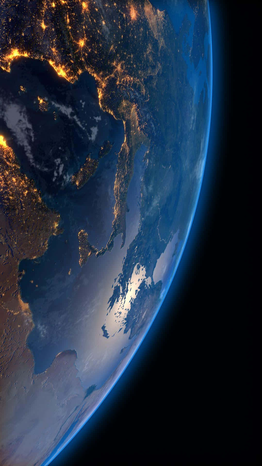 3d Earth 桌布 壁紙 — 從太空俯瞰地球的壯麗夜景，展現出深藍色海洋和旋轉雲層中閃爍的城市燈光。