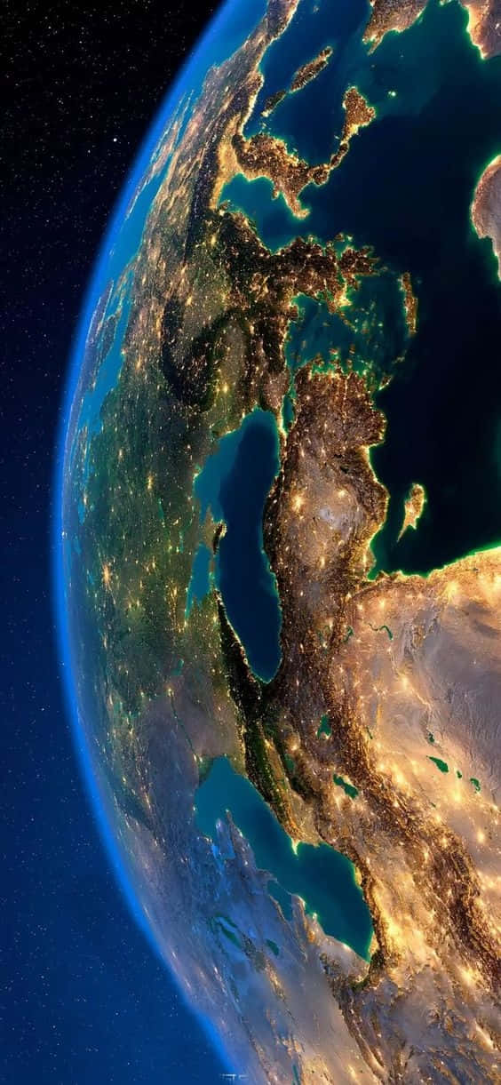 地球 桌布 壁紙 — 從太空俯瞰地球的壯麗夜景，展現星空下各大洲和海洋上閃爍的城市燈光。