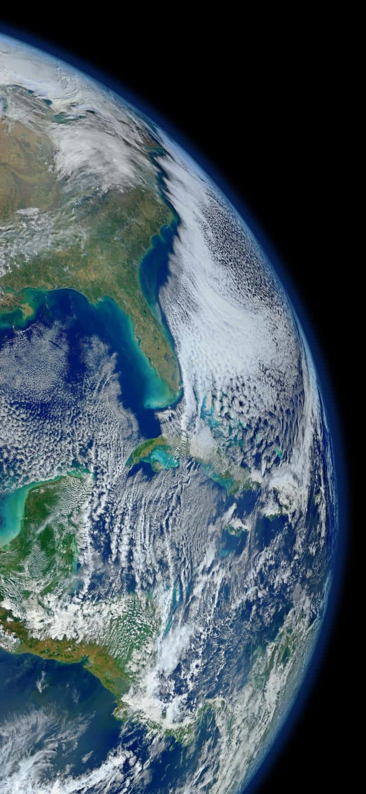 planet earth 桌布 壁紙 — 從太空俯瞰地球的壯麗景色，展現了在黑色太空背景下旋轉的雲層、海洋和大陸。
