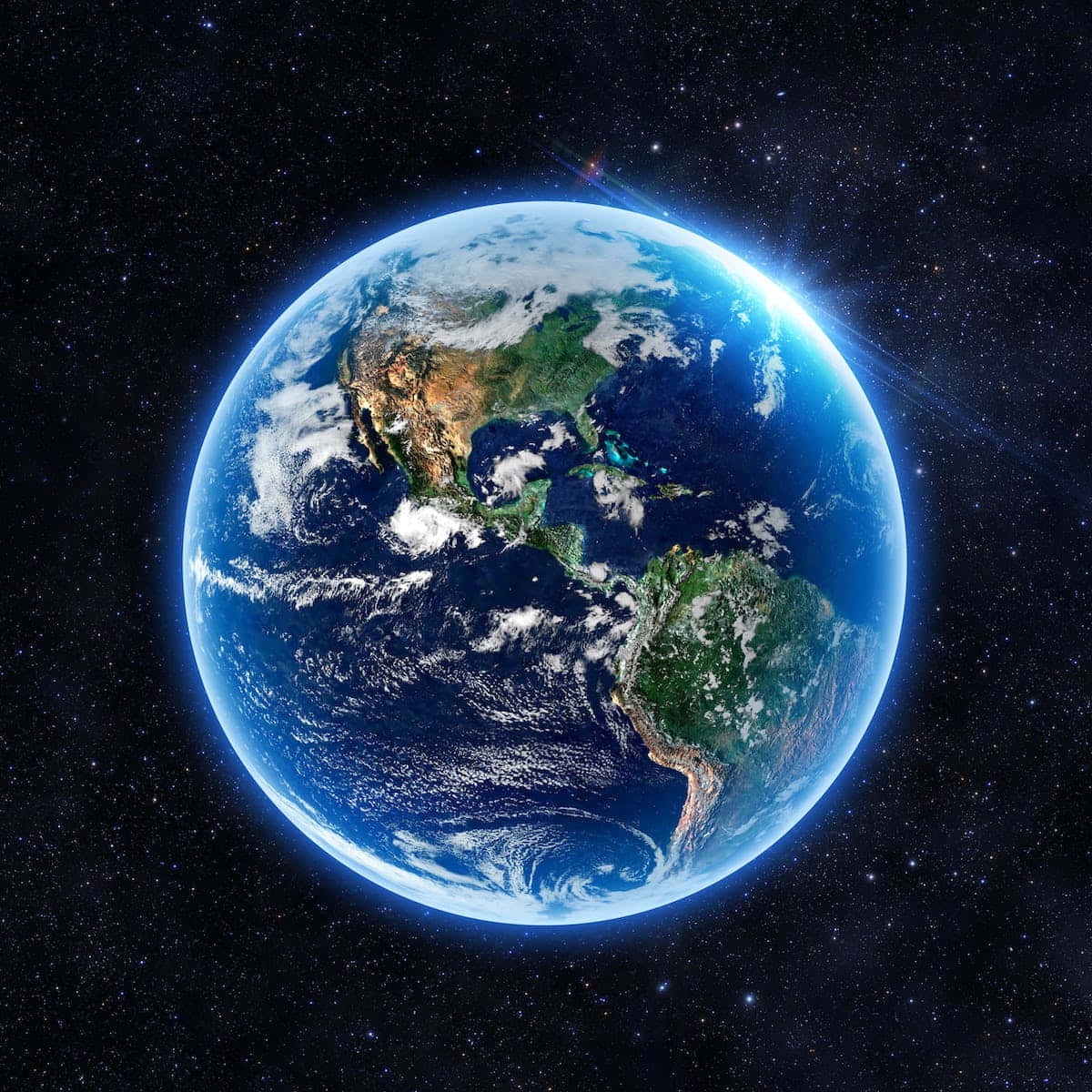 World 桌布 壁紙 — 從太空俯瞰地球的壯麗景色，展現沐浴在陽光下的北美洲和南美洲，背景是繁星點點的宇宙。