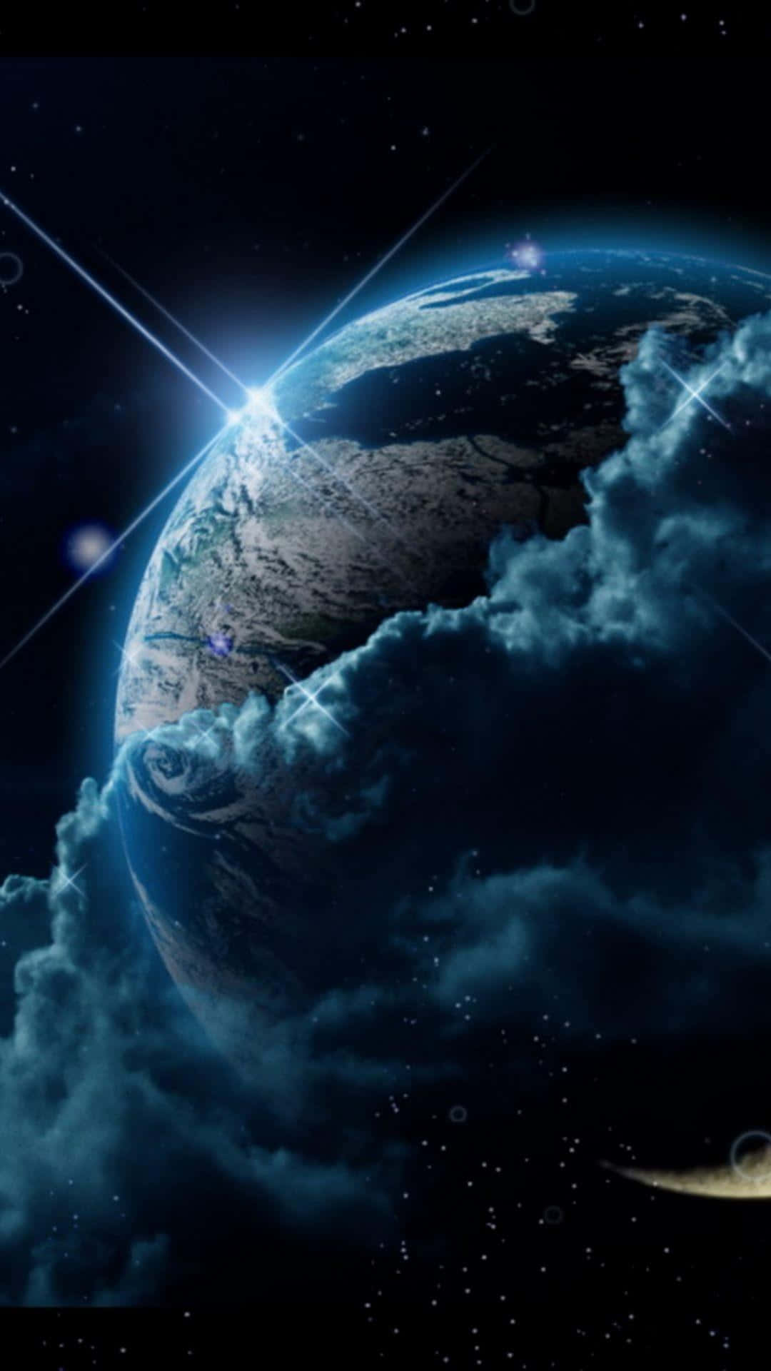 planet earth 桌布 壁紙 — 從太空俯瞰地球的壯麗景色，明亮的星爆照亮了行星彎曲的地平線和旋轉的藍色雲層，背景是繁星點點的虛空。