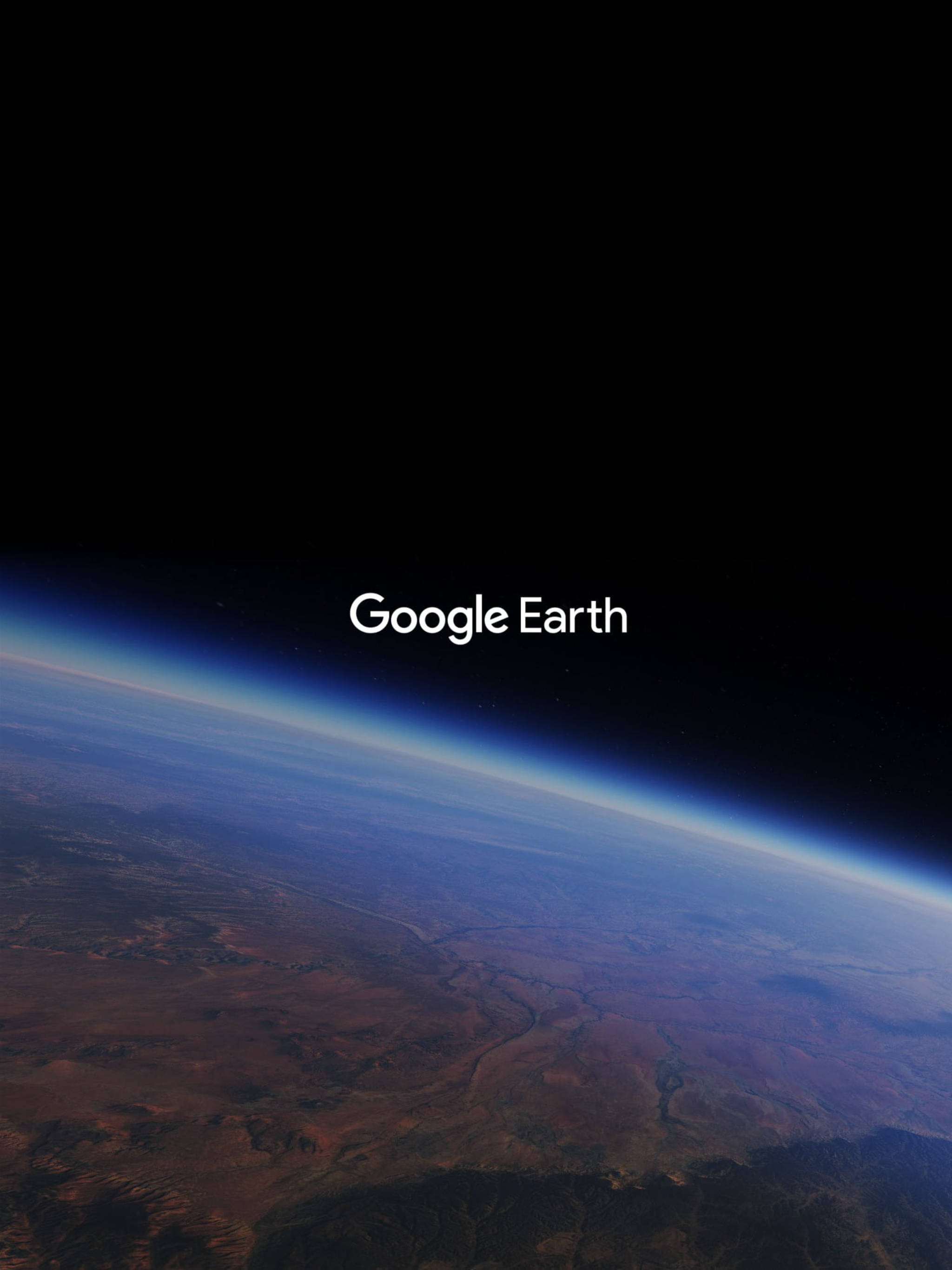 Google 地球 桌布 壁紙 — 從太空俯瞰地球的壯麗景色，顯示出彎曲的地平線，下方是藍色大氣層和紅褐色地形。