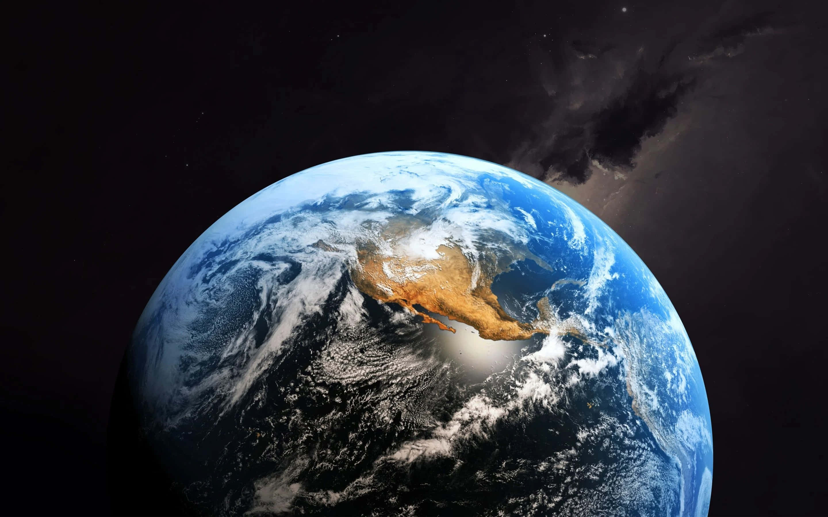 地球 桌布 壁紙 — 從太空俯瞰地球的壯麗景色，顯示北美洲被旋轉的藍色海洋和白色雲層環繞，背景是繁星點點的黑色虛空。