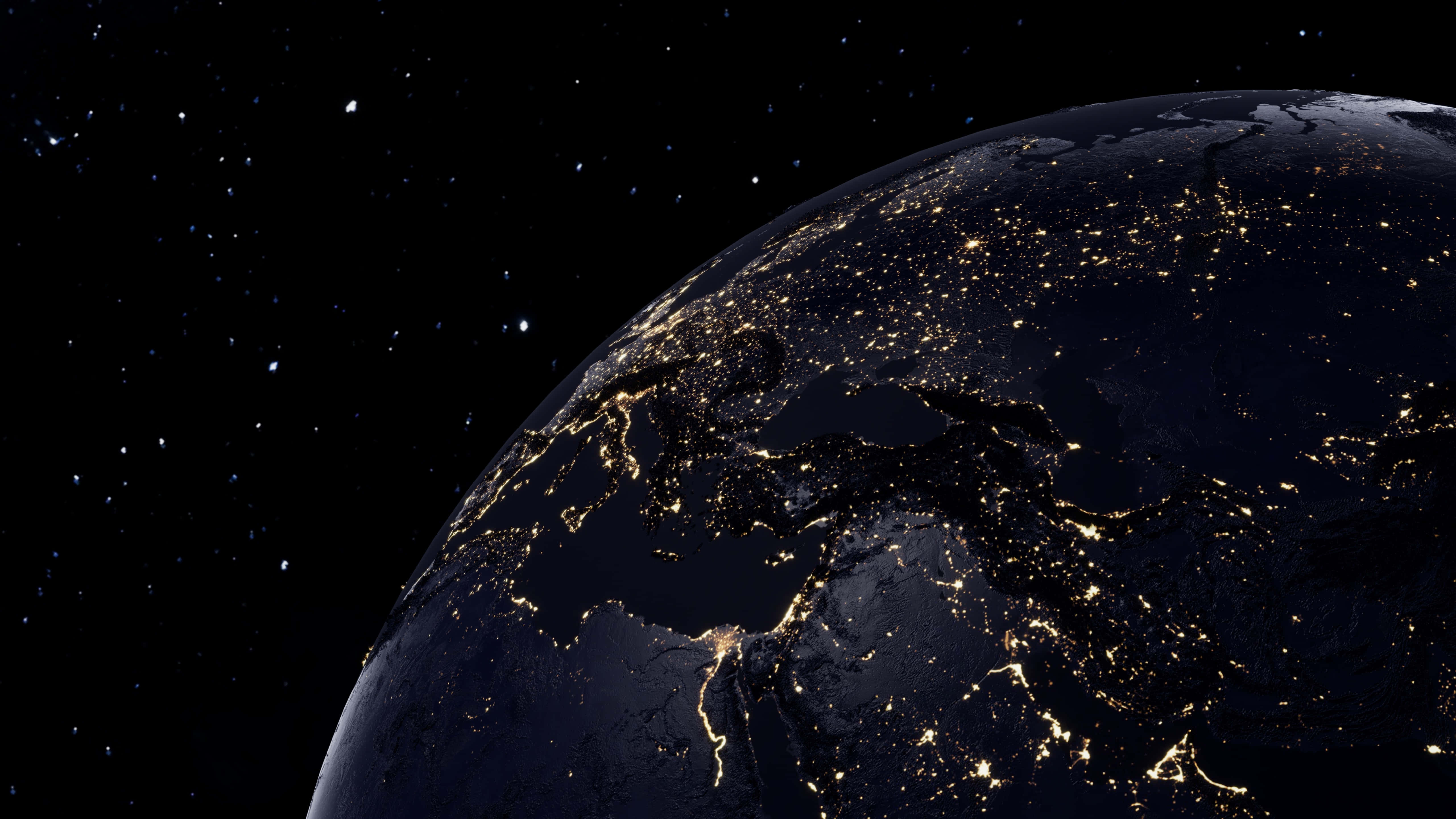 planet earth 桌布 壁紙 — 從太空俯瞰地球的絕美夜景，展現黑暗海洋和星空下閃爍的城市燈光。