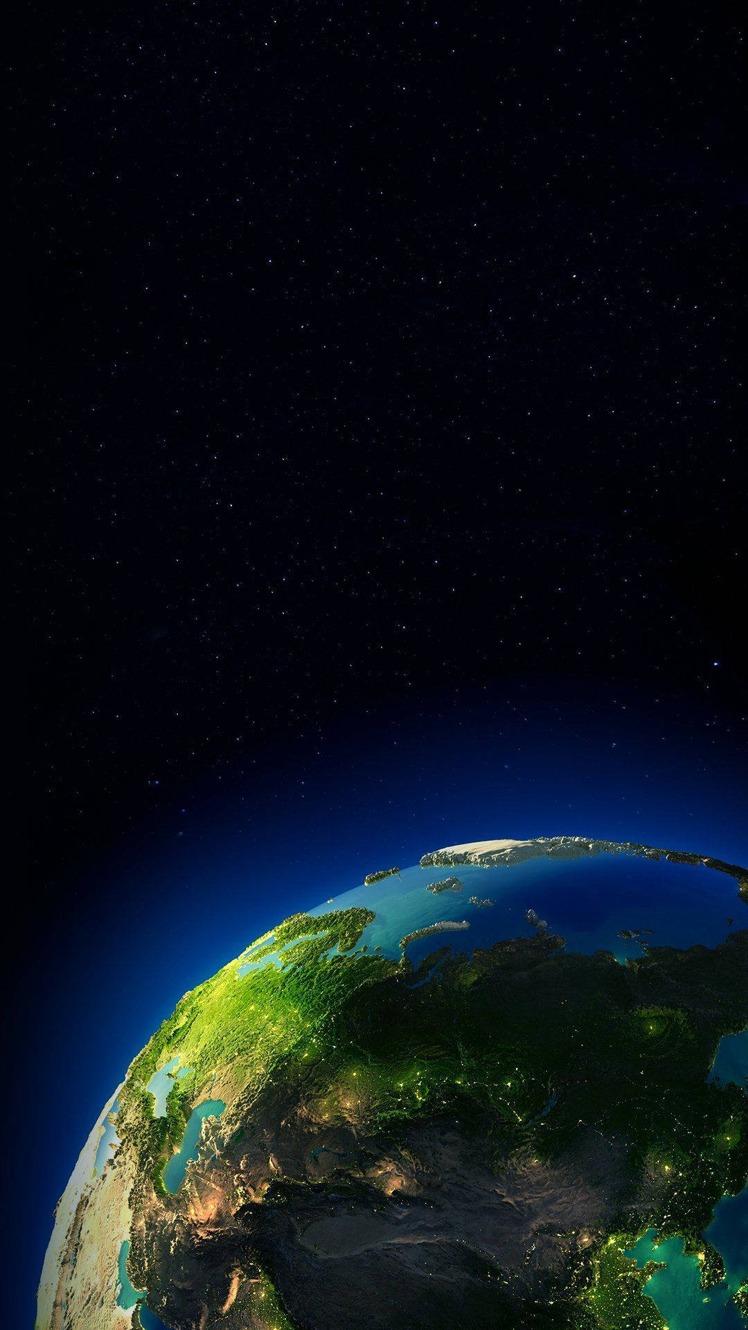 AMOLED 桌布 壁紙 — 從太空夜間觀看地球的壯麗景色，城市燈光閃爍，星空漆黑一片。