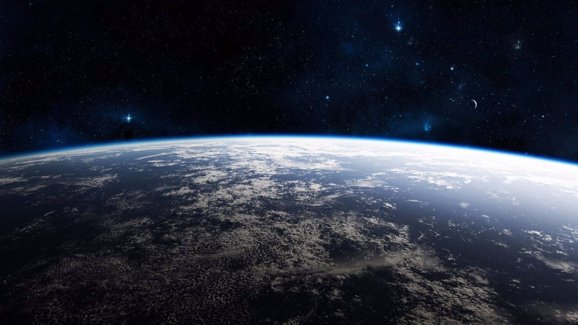 從軌道上看到的地球，黑暗的天空中有雲和星星。 — 4K 地球 壁紙